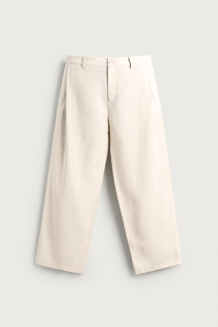 FLOWING TROUSERS WITH SIDE PLEATS