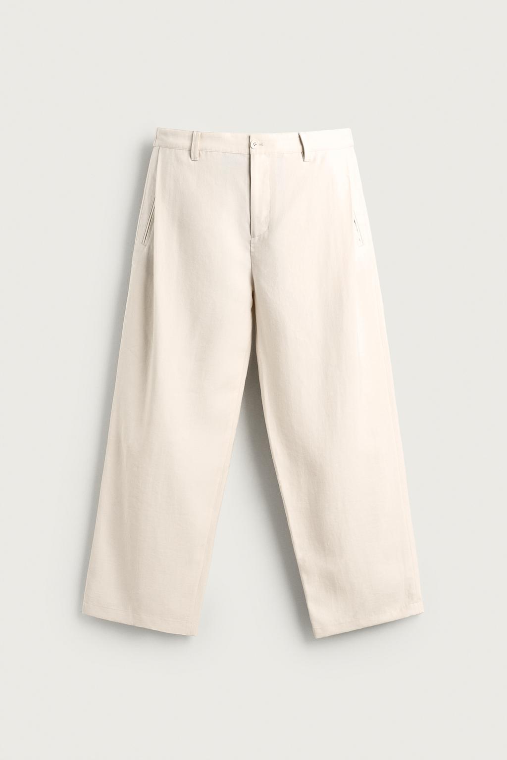 FLOWING TROUSERS WITH SIDE PLEATS