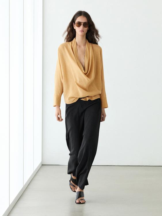 Flowing blouse with draped neckline from Zara - $130