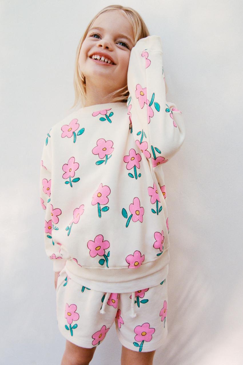 PRINTED BERMUDA SHORTS