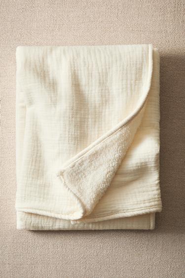 MANTA INFANTIL CÁLIDA REVERSIBLE - Crudo de Zara