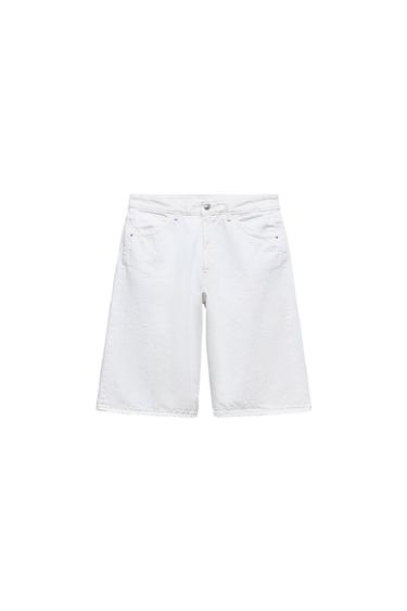 Front view of white shorts with front pockets and button fastening.