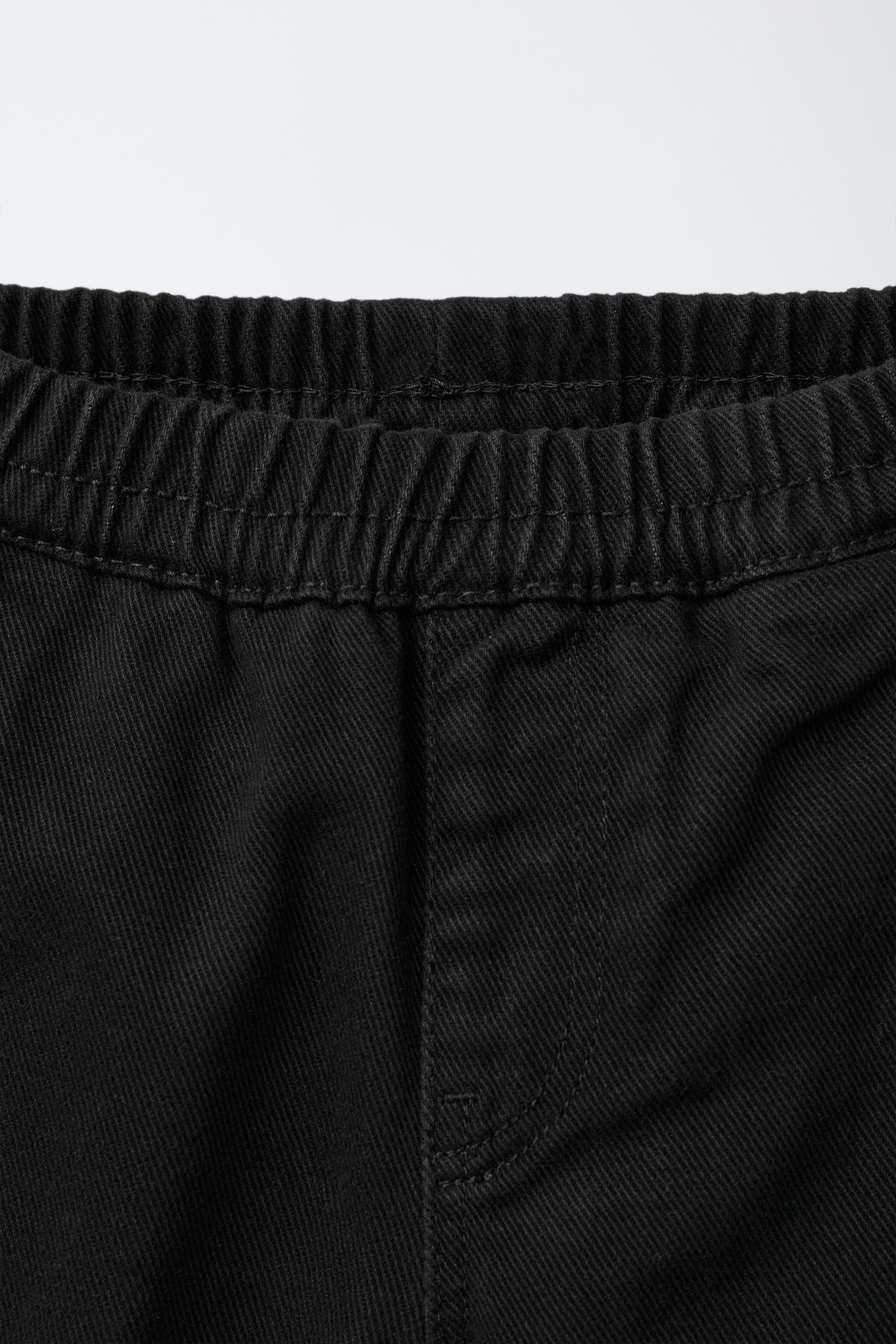 BALLOON PLEATED PANTS WITH LABELS