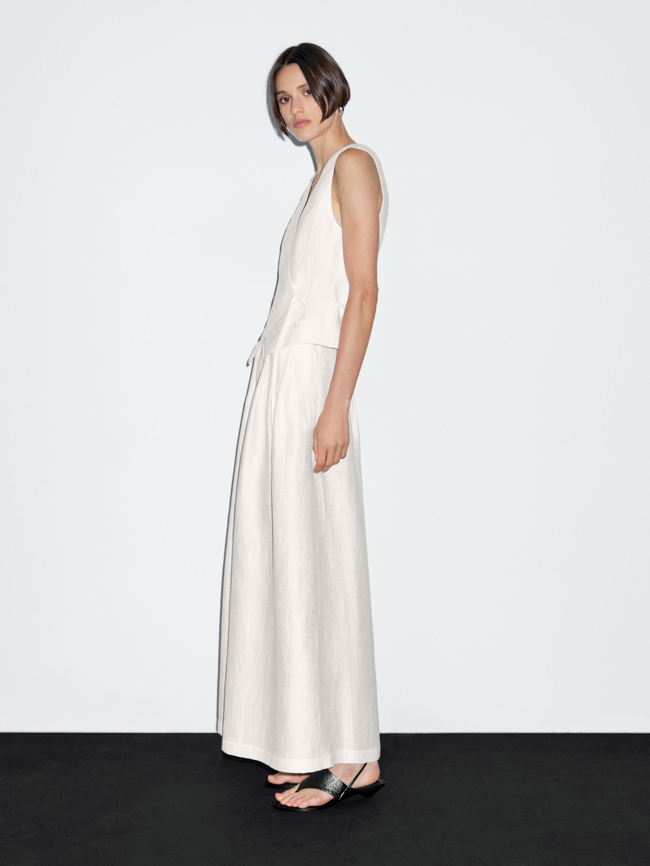 Wide-leg voluminous linen blend trousers