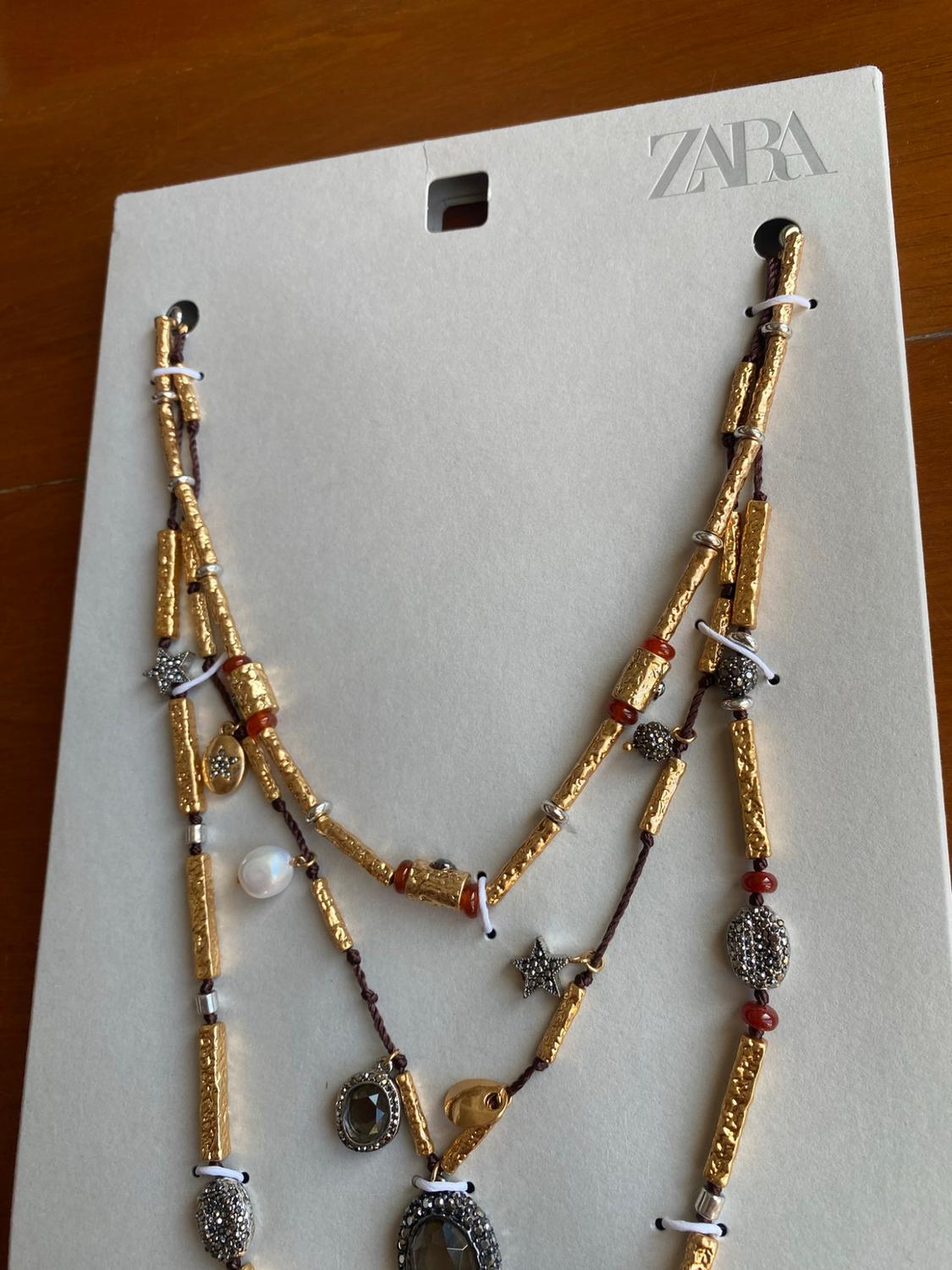 PACK OF 3 CORD NECKLACES WITH CHARMS AND JEWELS - Image 3