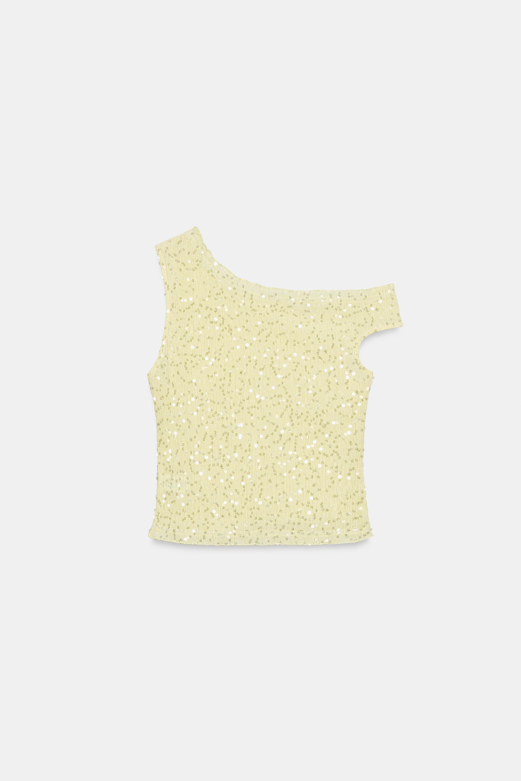 TOP ASYMÉTRIQUE À PAILLETTES