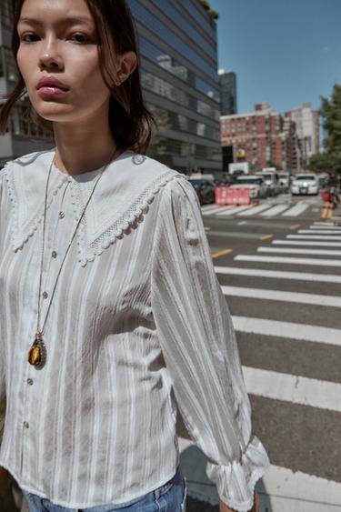 قميص بياقة بيتر بان دانتيل - أبيض مكسور الخاص بـ Zara