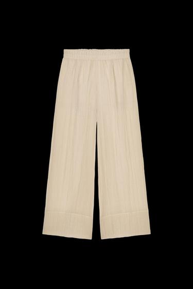 SEMITRANSPARENTE HOSE MIT WEITEM BEIN IM KNITTERLOOK - Hellbeige von Zara - Bild 0