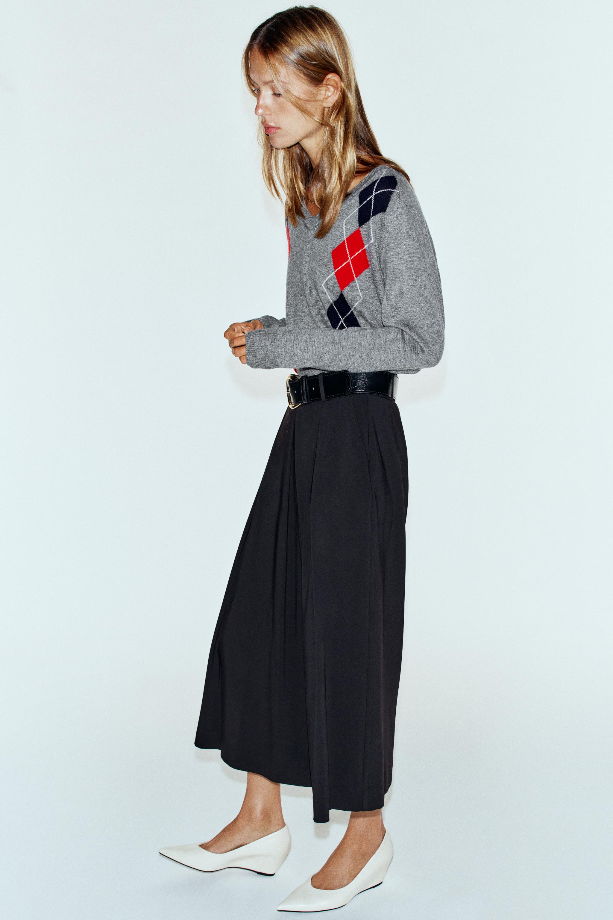 JUPE-CULOTTE À PLIS ET CEINTURE