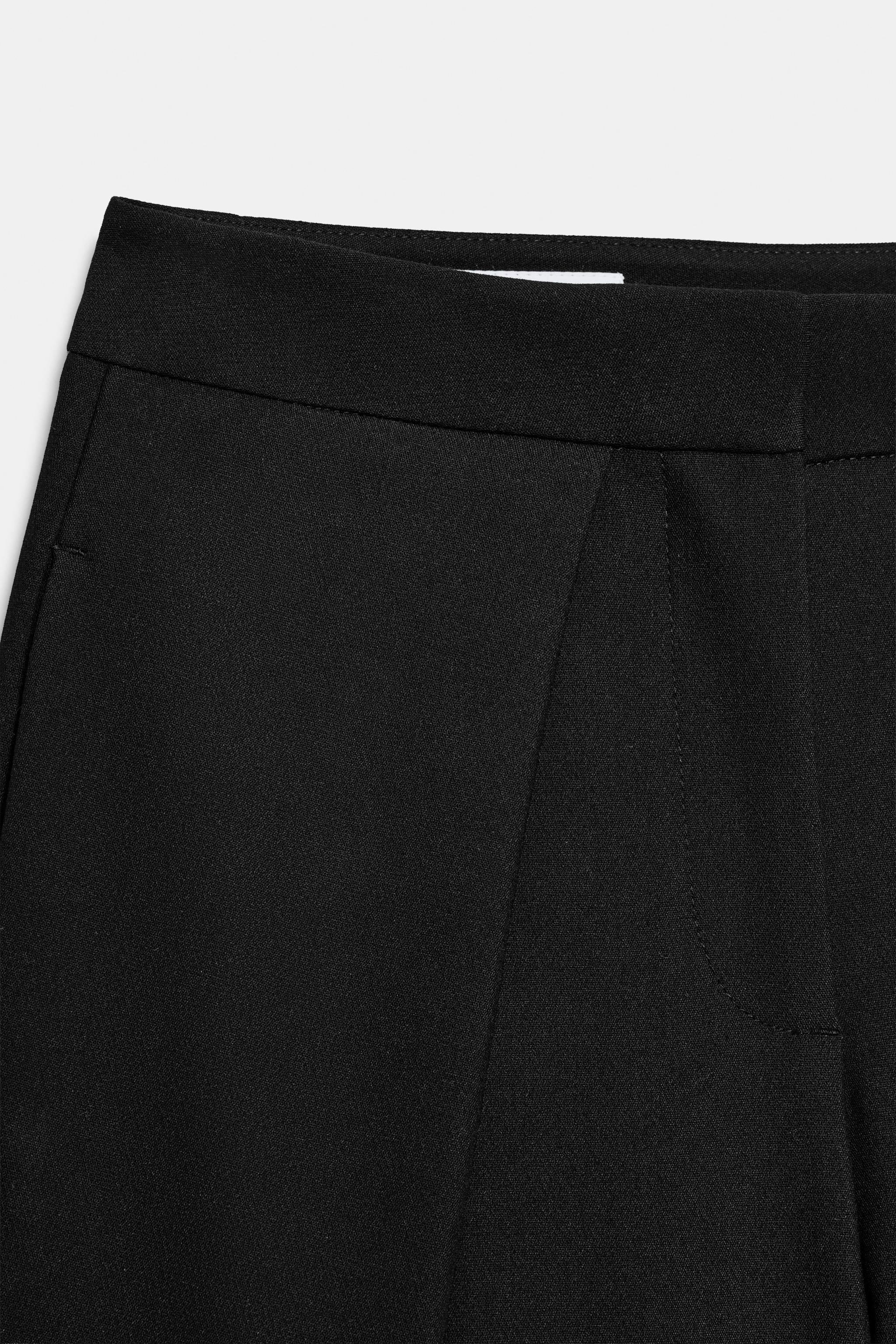 PANTALON LARGE À PLIS