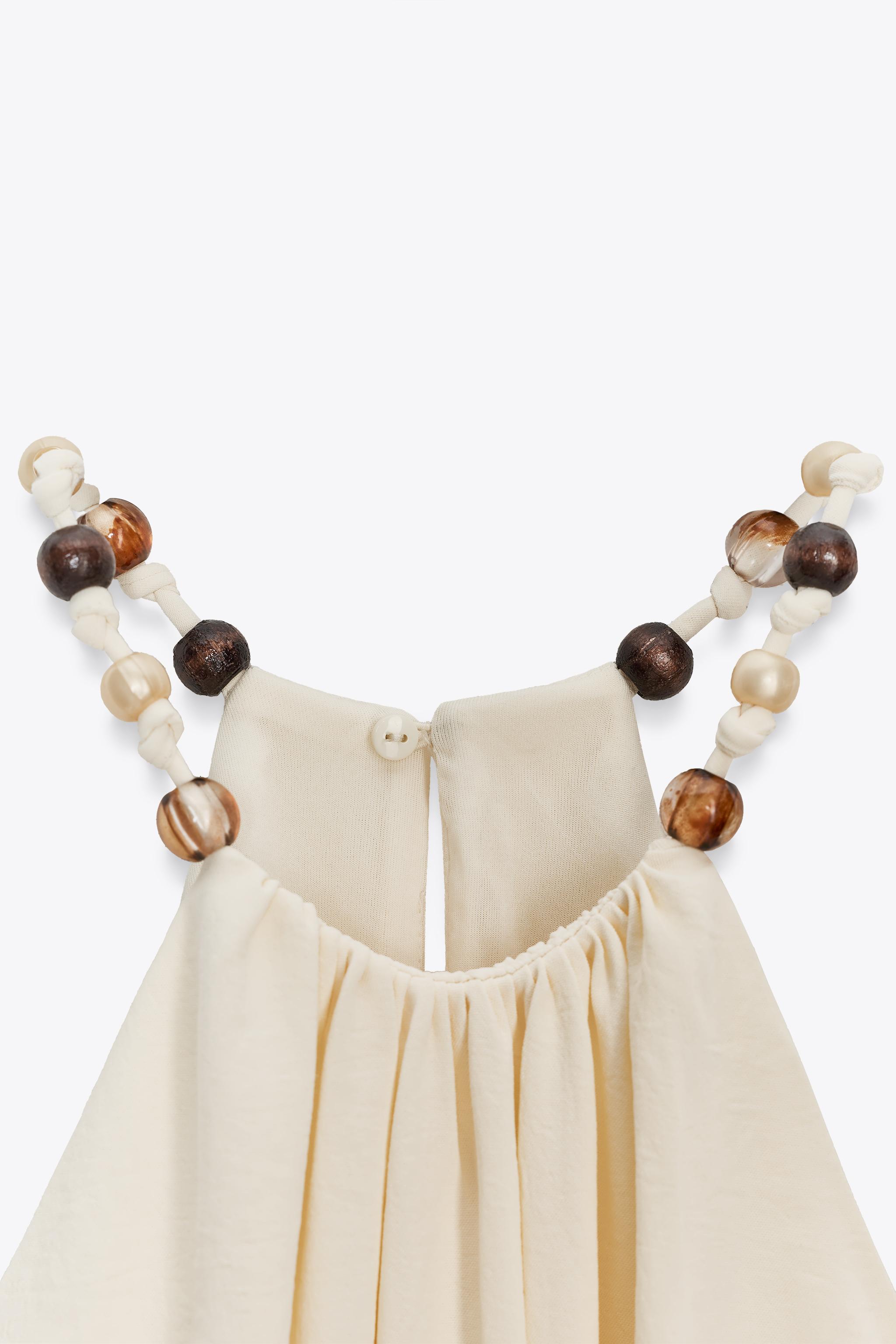 ROBE MIDI AJOURÉE NŒUD