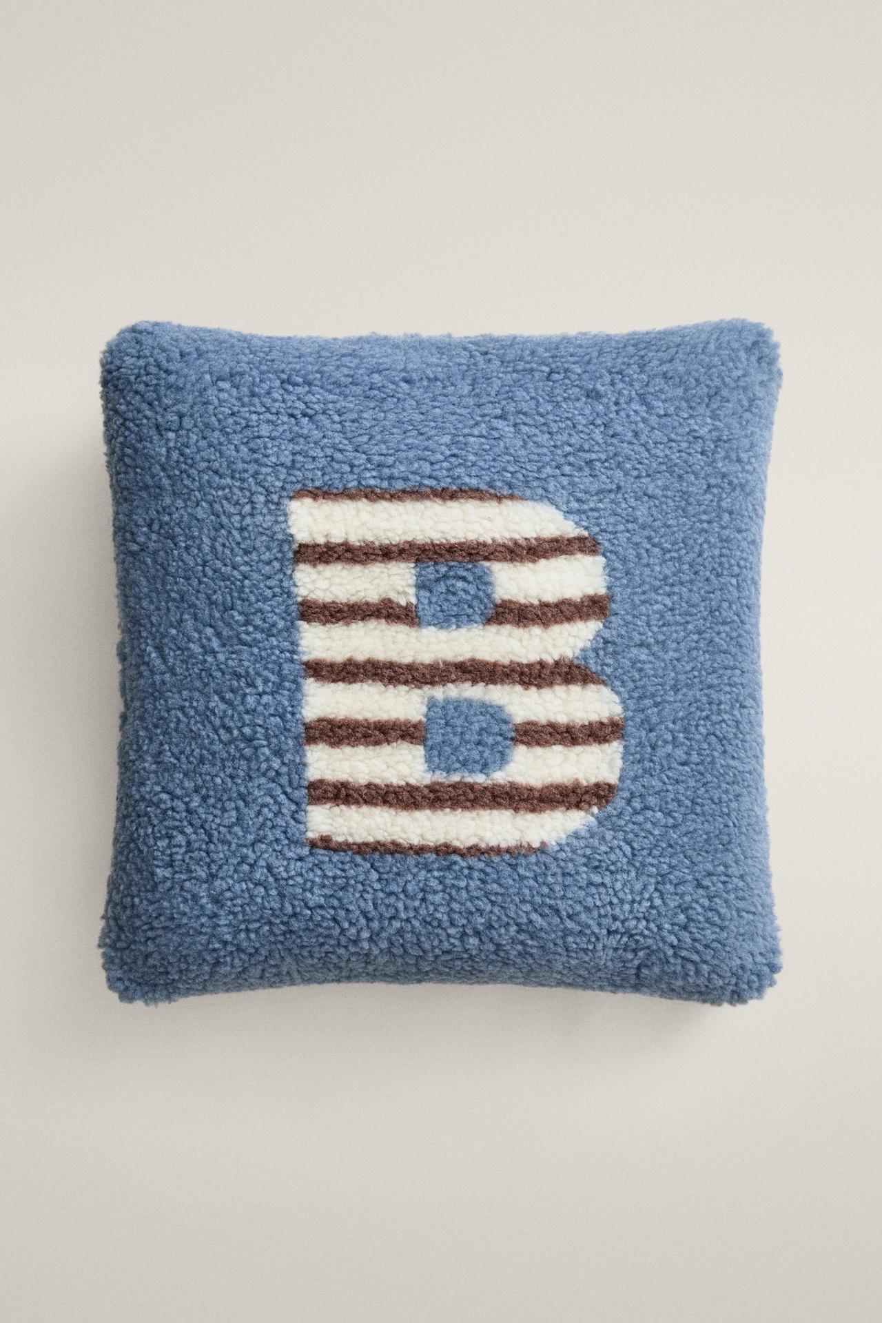 CHILDREN'S FAUX SHEARLING CUSHION WITH B