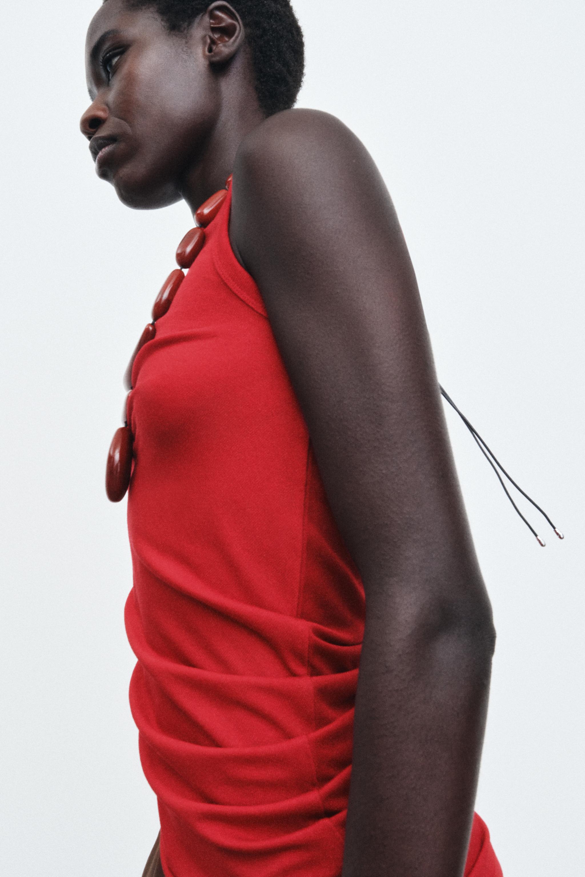 DRAPED SLEEVELESS TOP