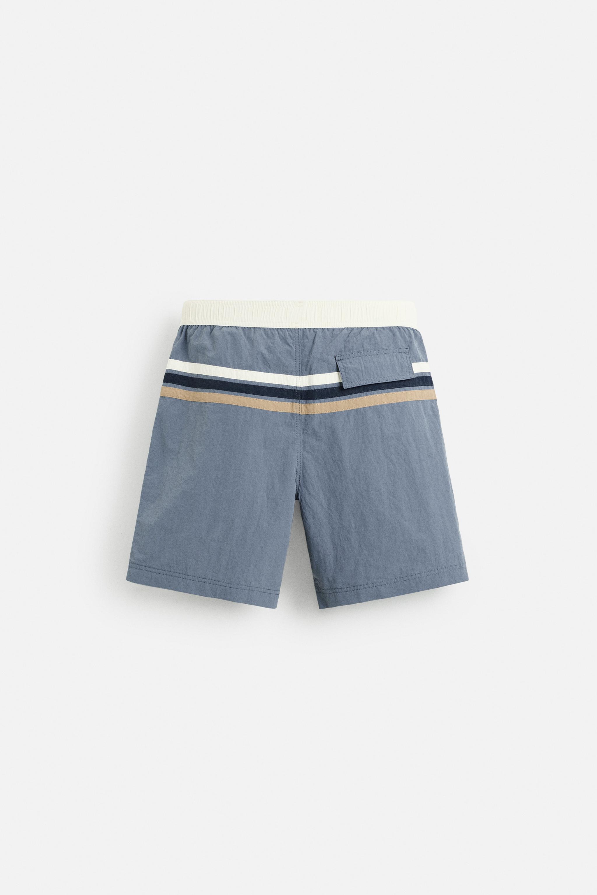 MAILLOT DE BAIN LONG À BANDES