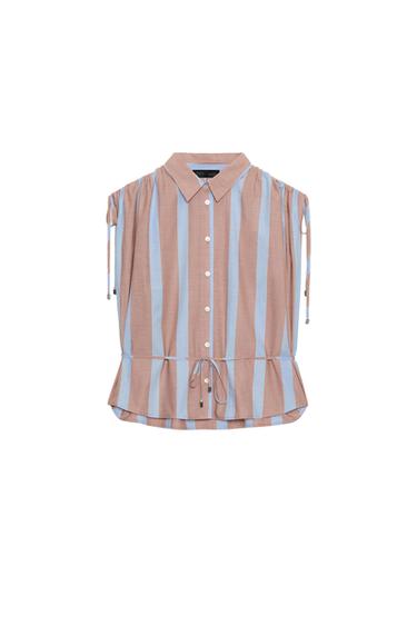 Front view of a brown and blue striped shirt, with a shirt collar, sleeveless, with drawstrings on the shoulders and waist, and button fastening.
