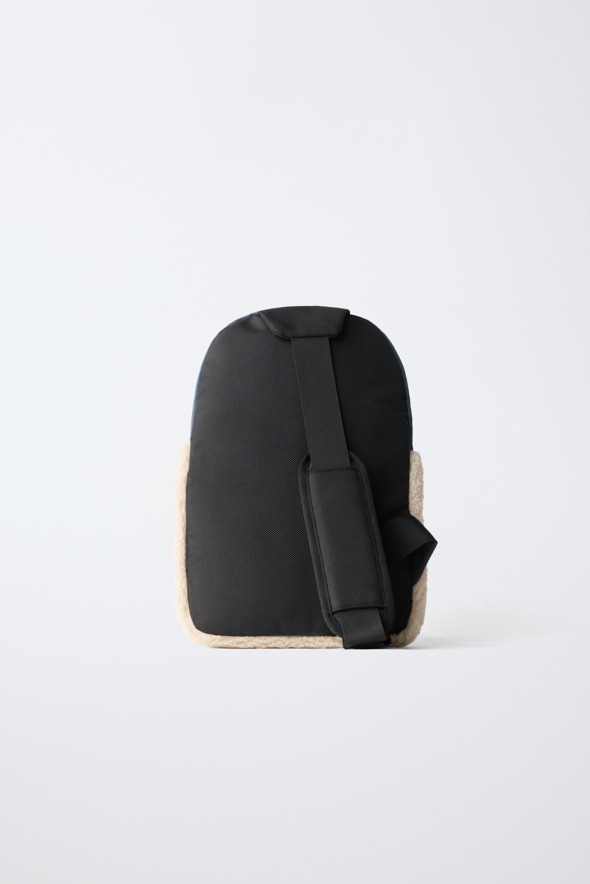 TECHNICAL FAUX SHEARLING CROSSBODY BAG