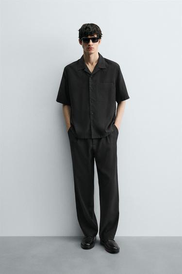 RELAXED FIT PLEATED TROUSERS - Black by Zara