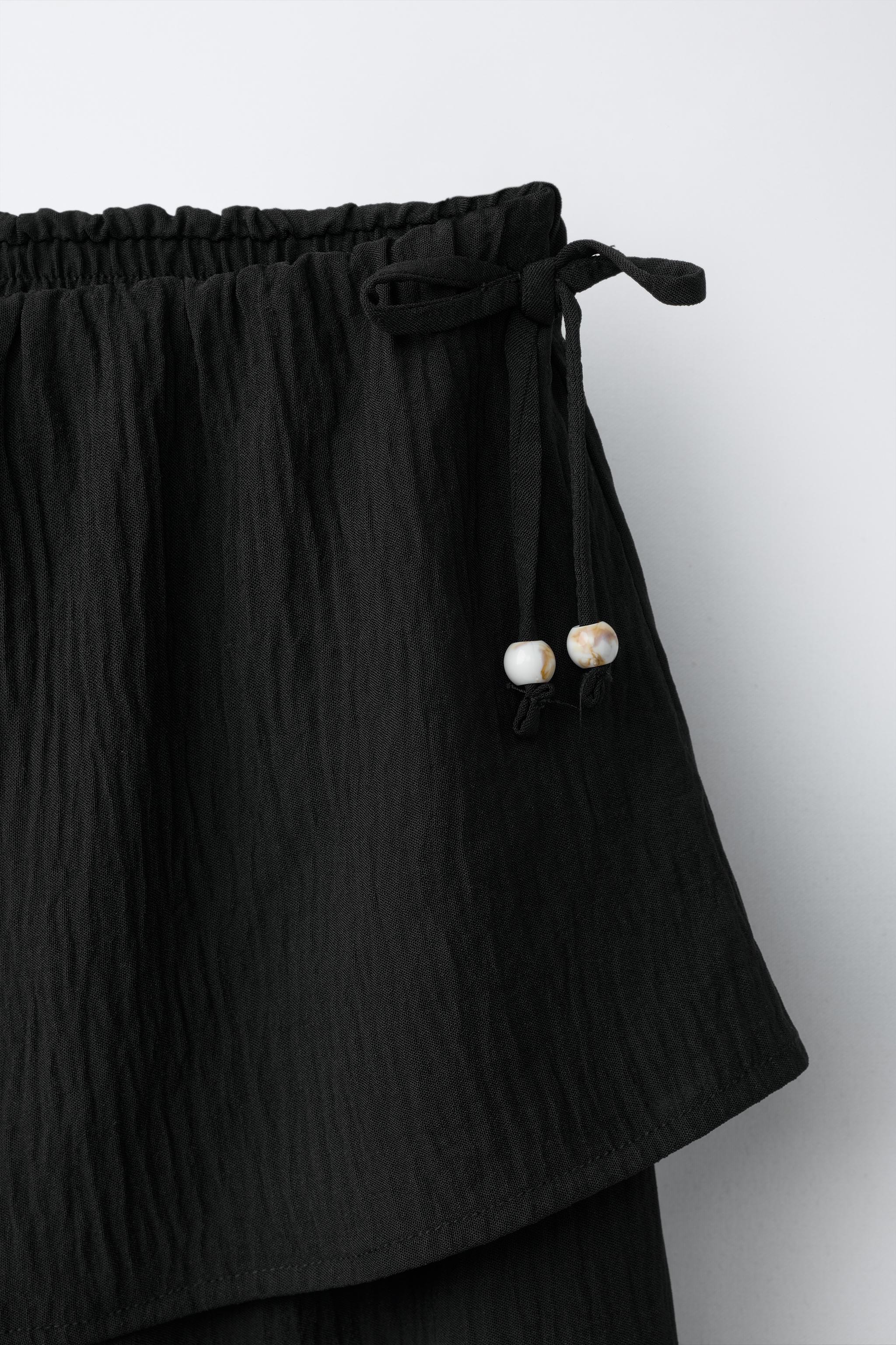 TEXTURED WIDE LEG SKIRT PANTS