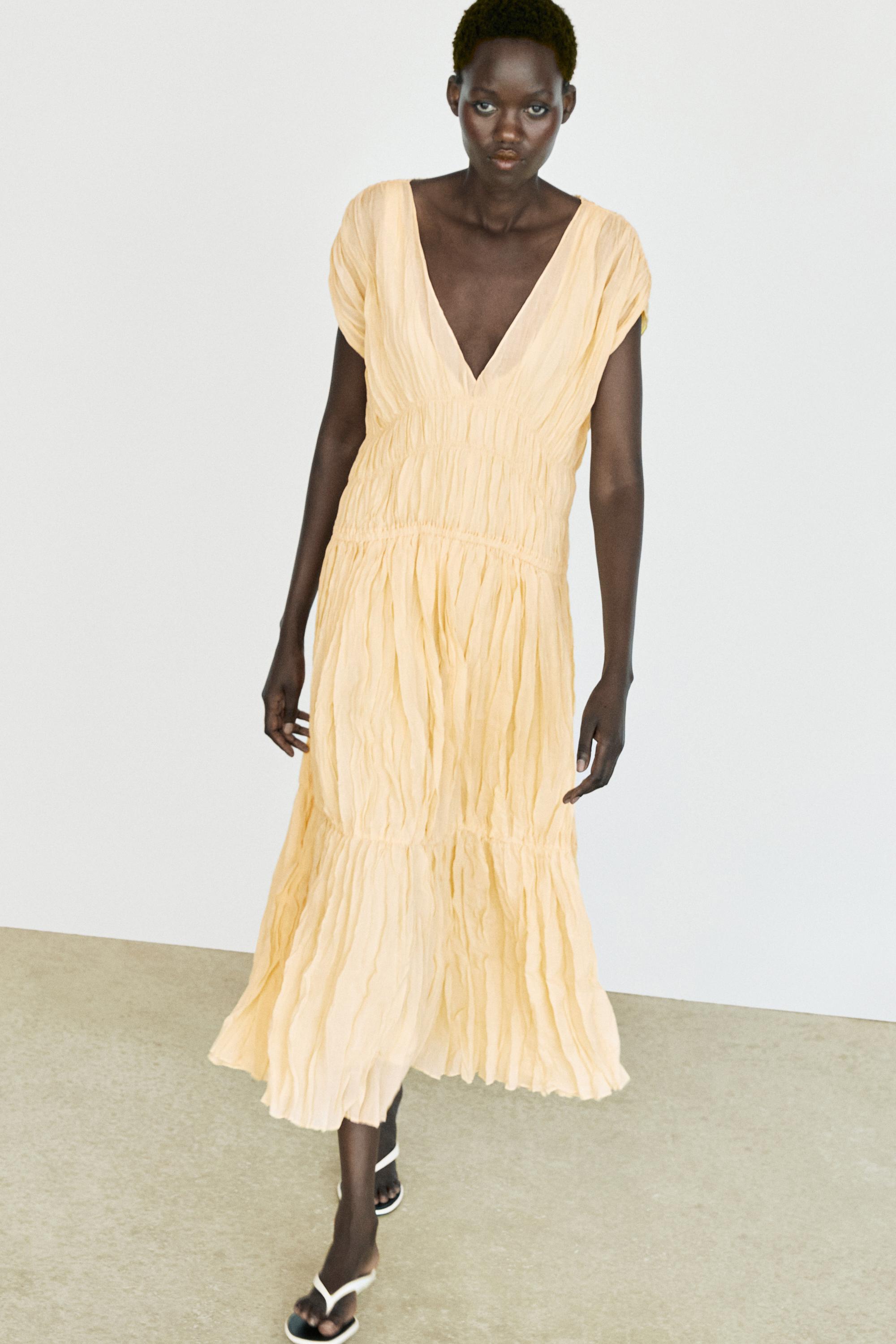 Robe midi fluide froncée