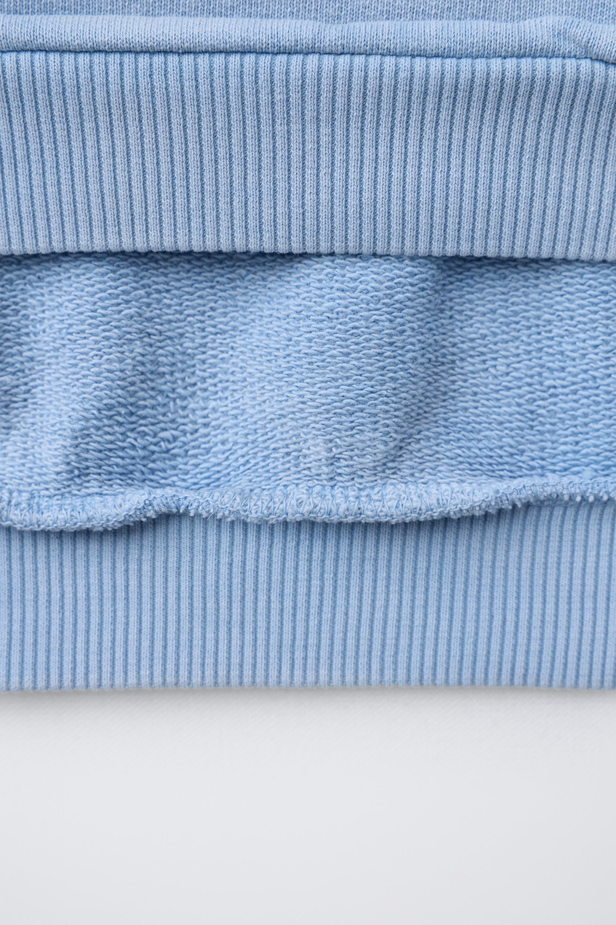 SWEAT INSCRIPTION EN RELIEF