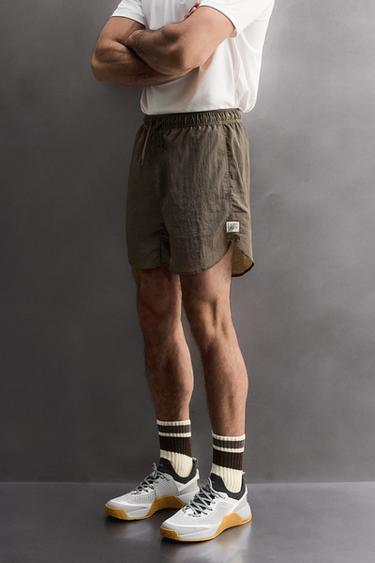 PANTALONES CORTOS 2 EN 1 TRAINING - Marrón de Zara