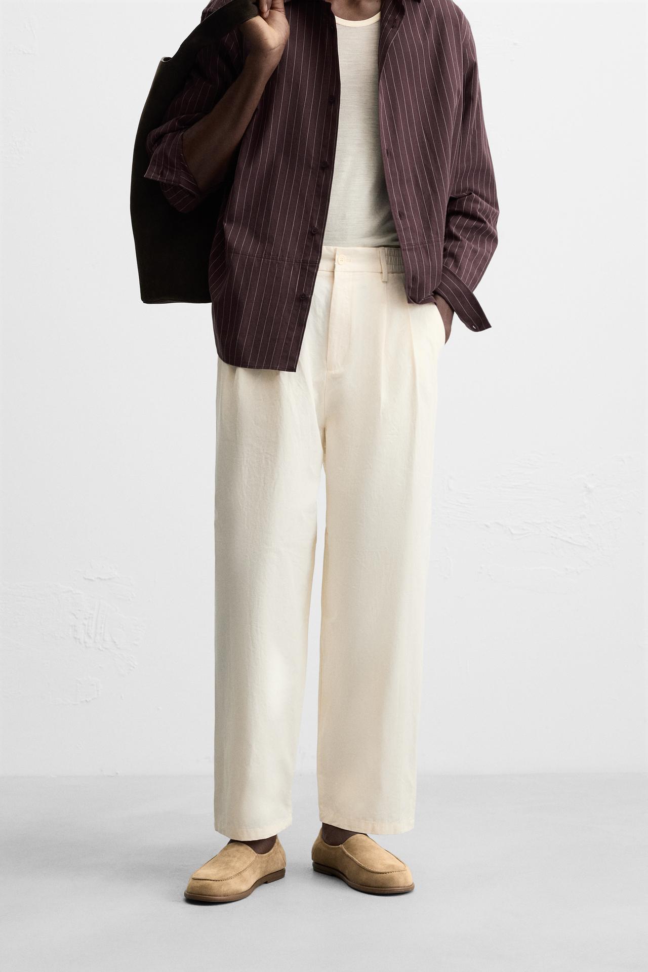 PLEATED CHINO TROUSERS - Ecru by Zara
