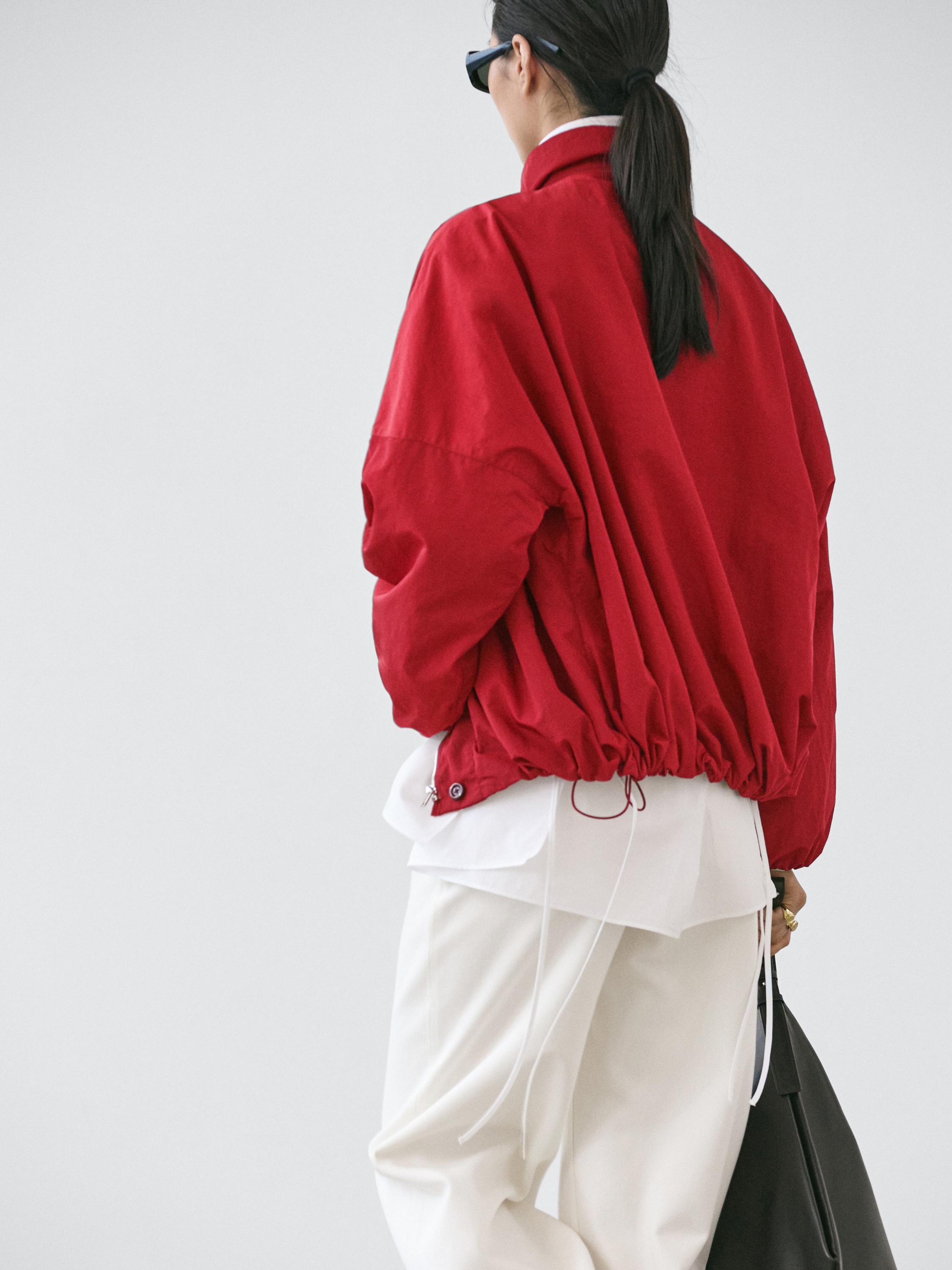 Veste bomber bouffante à col montant
