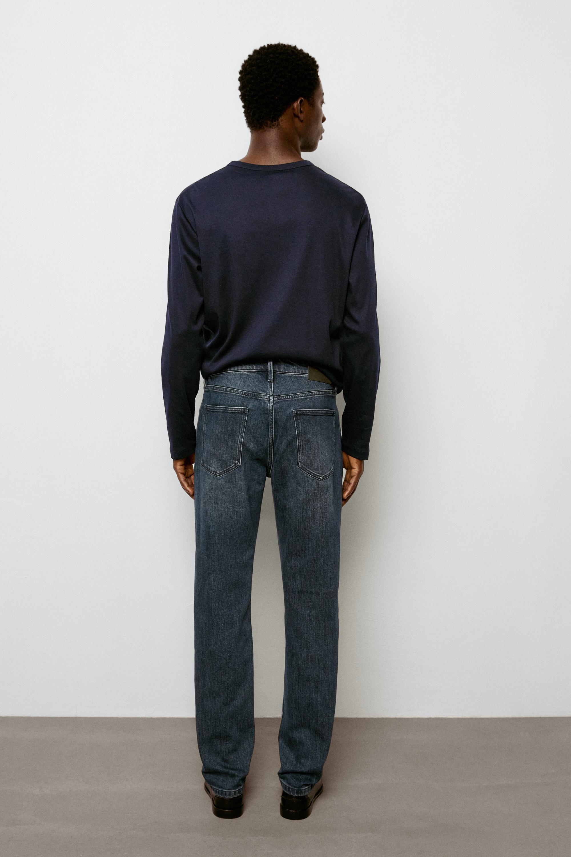 Enzymatic tapered fit jeans
