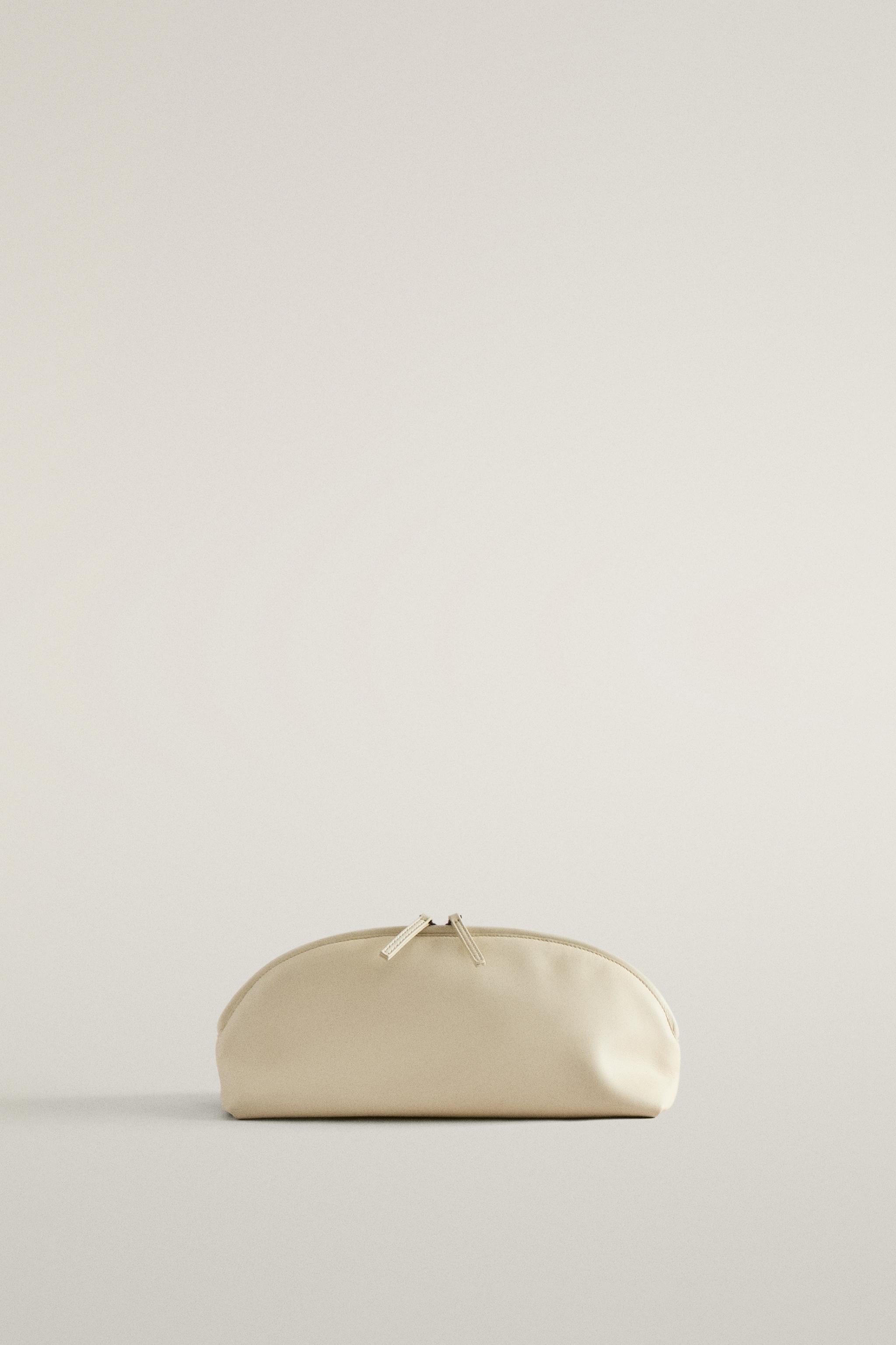 HALF-MOON NAPPA LEATHER SUEDE STEM MAKEUP BAG