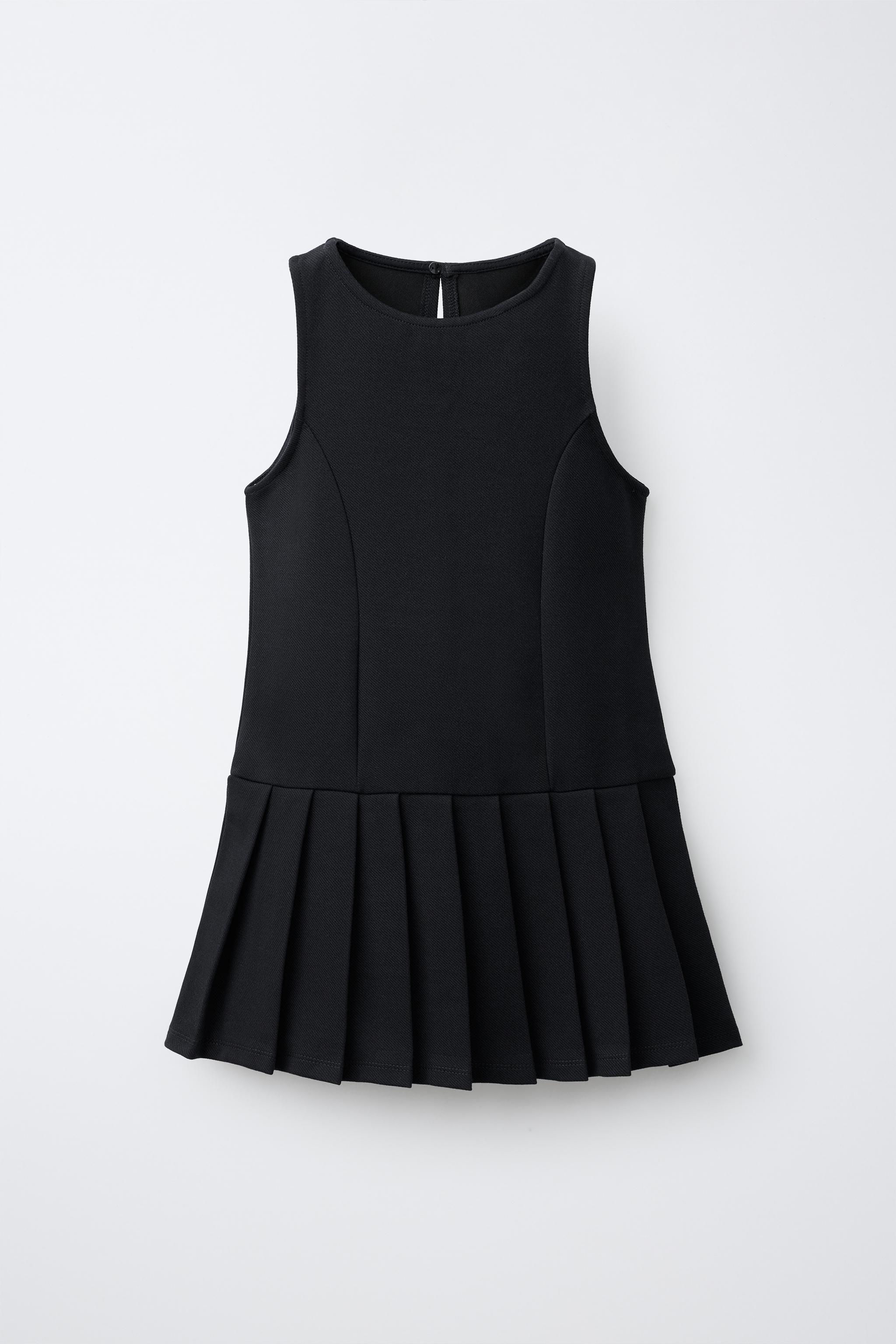 ROBE-SALOPETTE À PLIS