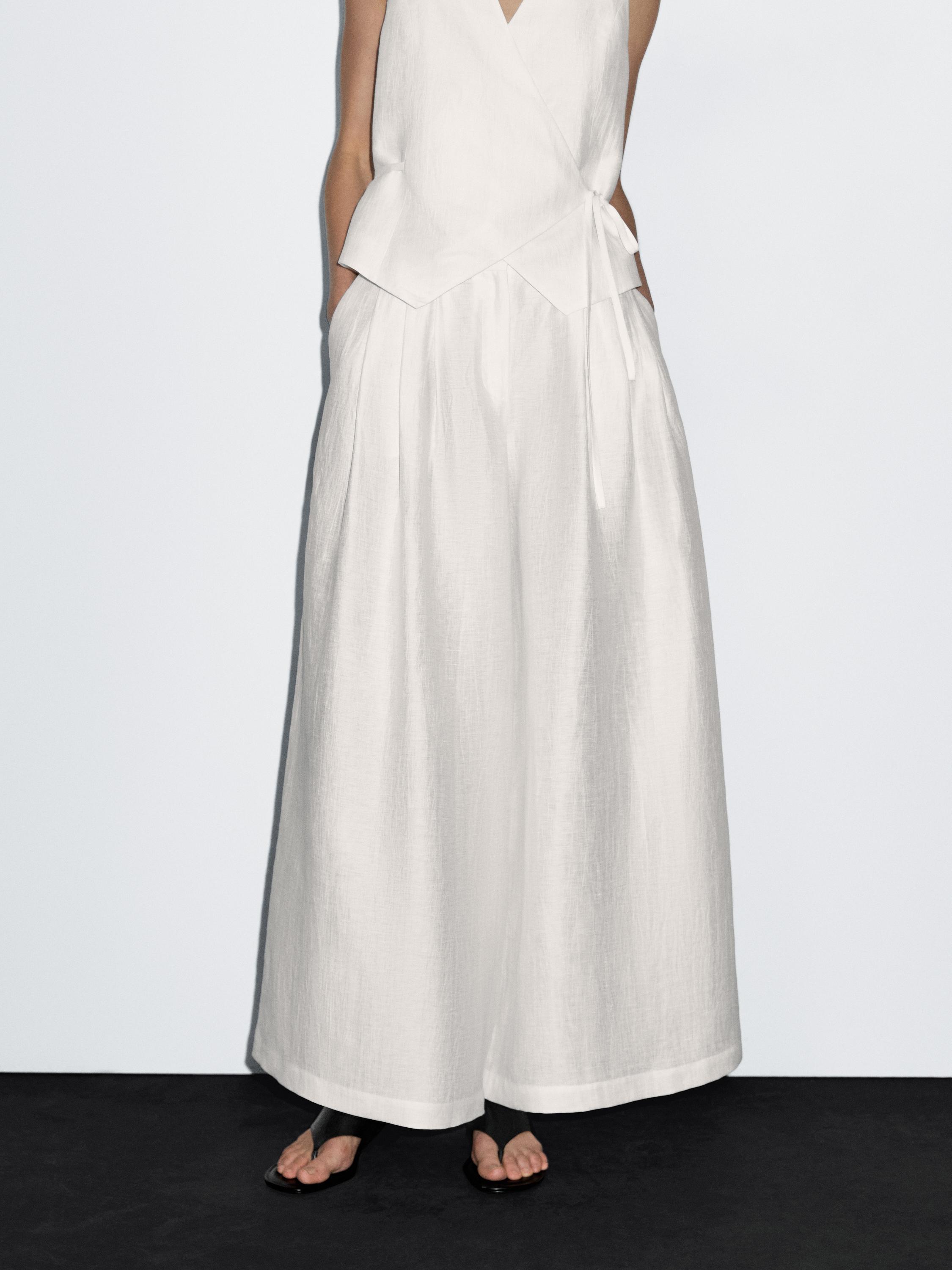 Wide-leg voluminous linen blend trousers