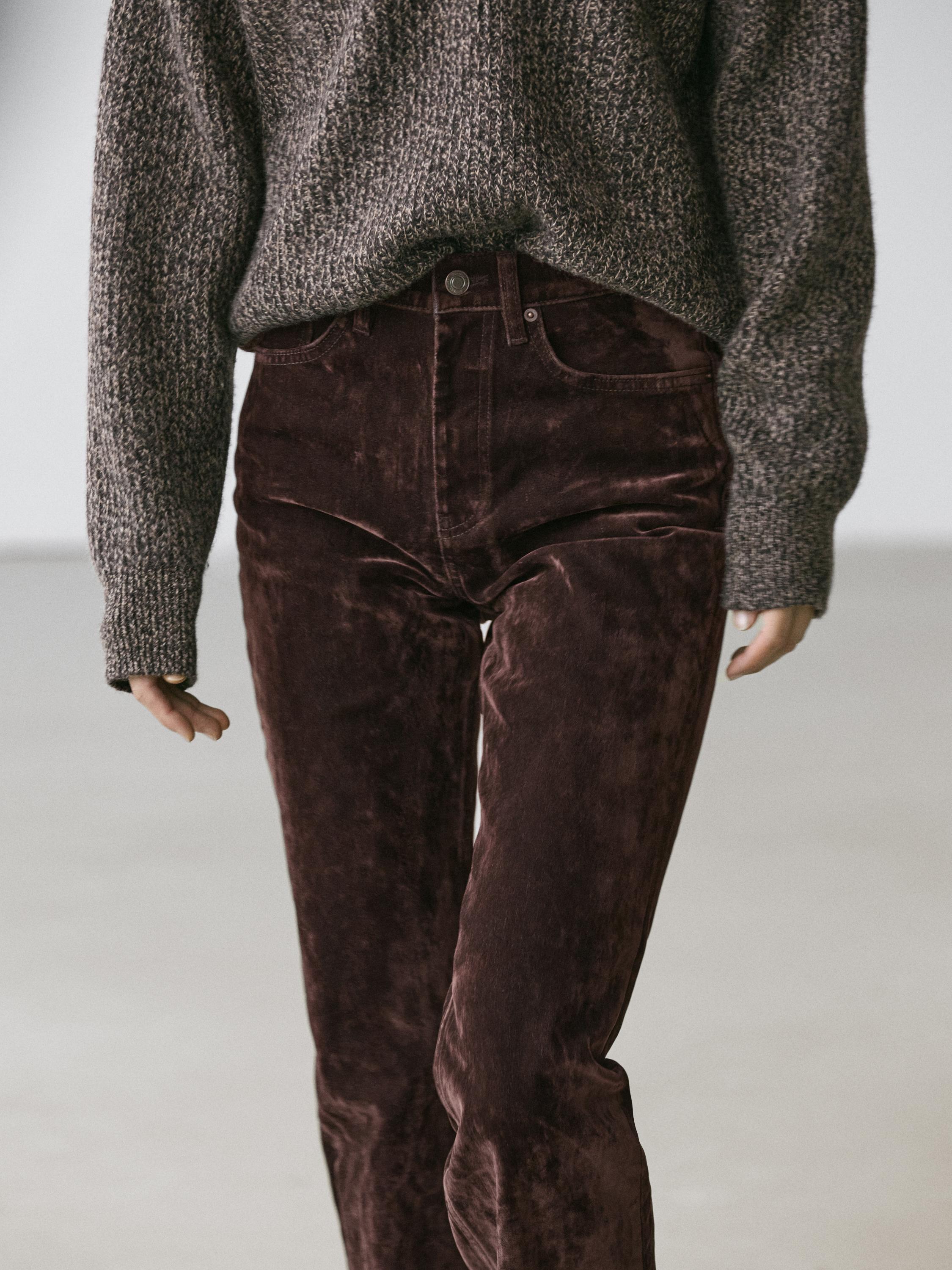 High-waist flocked boot-cut jeans