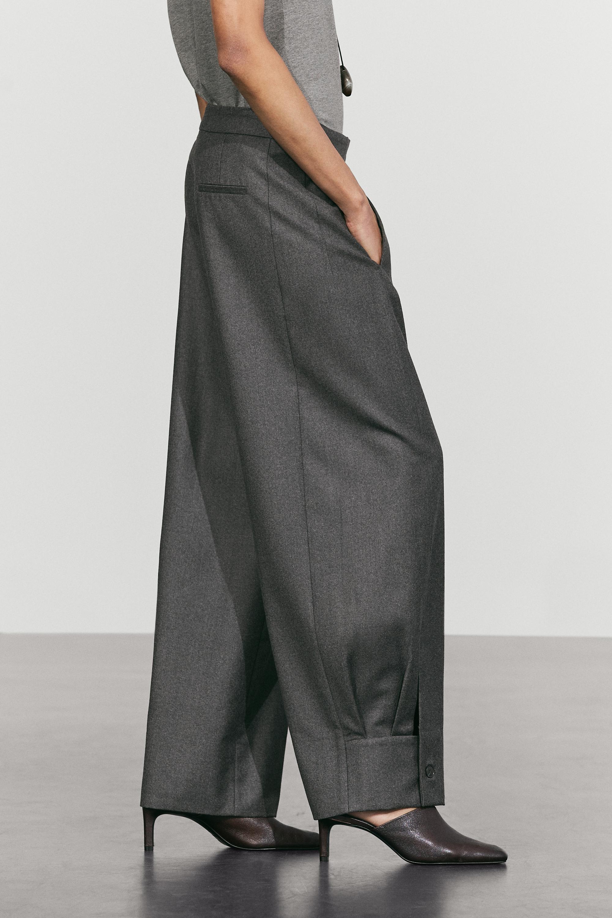 Pantalon 100 % laine détail bouton bas