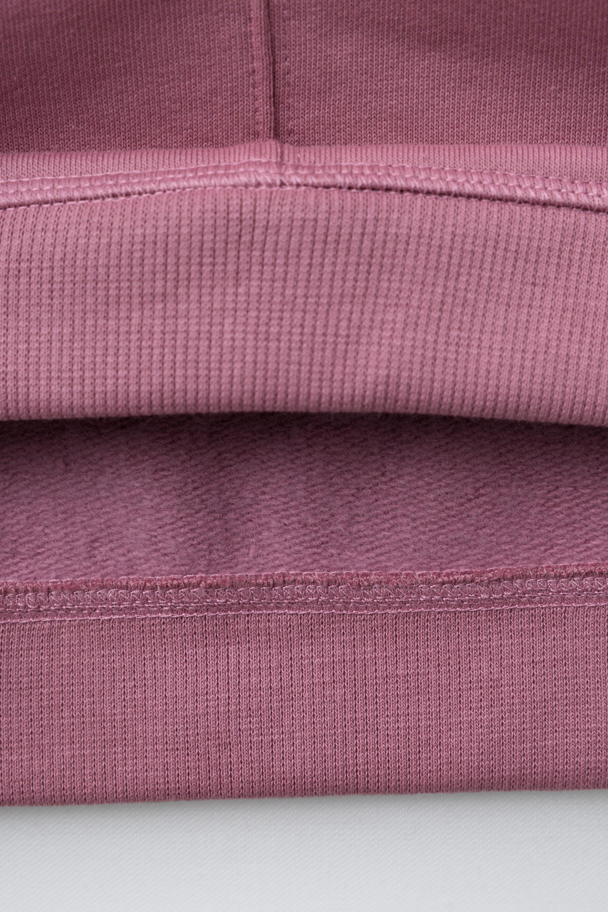 RAISED TEXT SWEATSHIRT