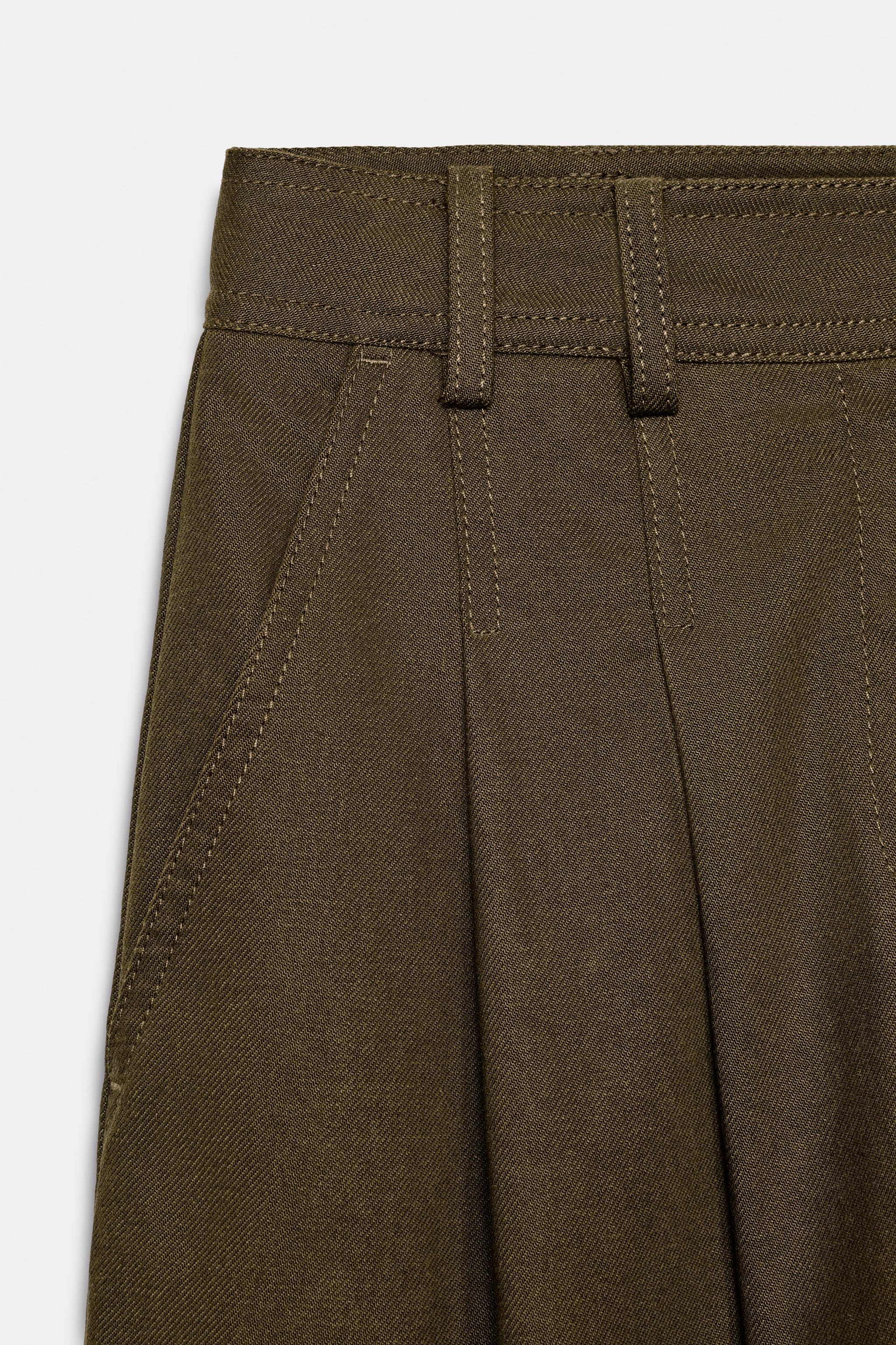WIDE-LEG PLEATED PANTS