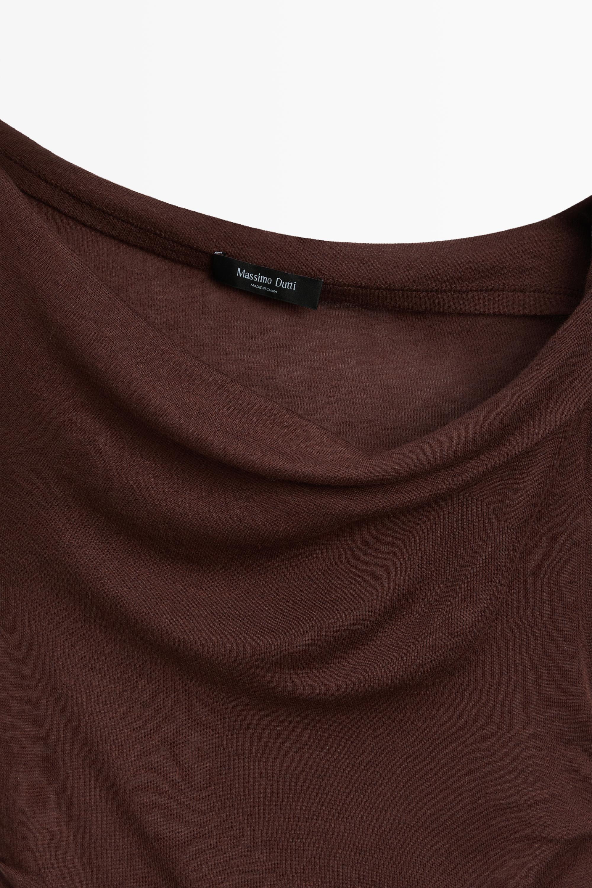 Asymmetric long sleeve flowing top