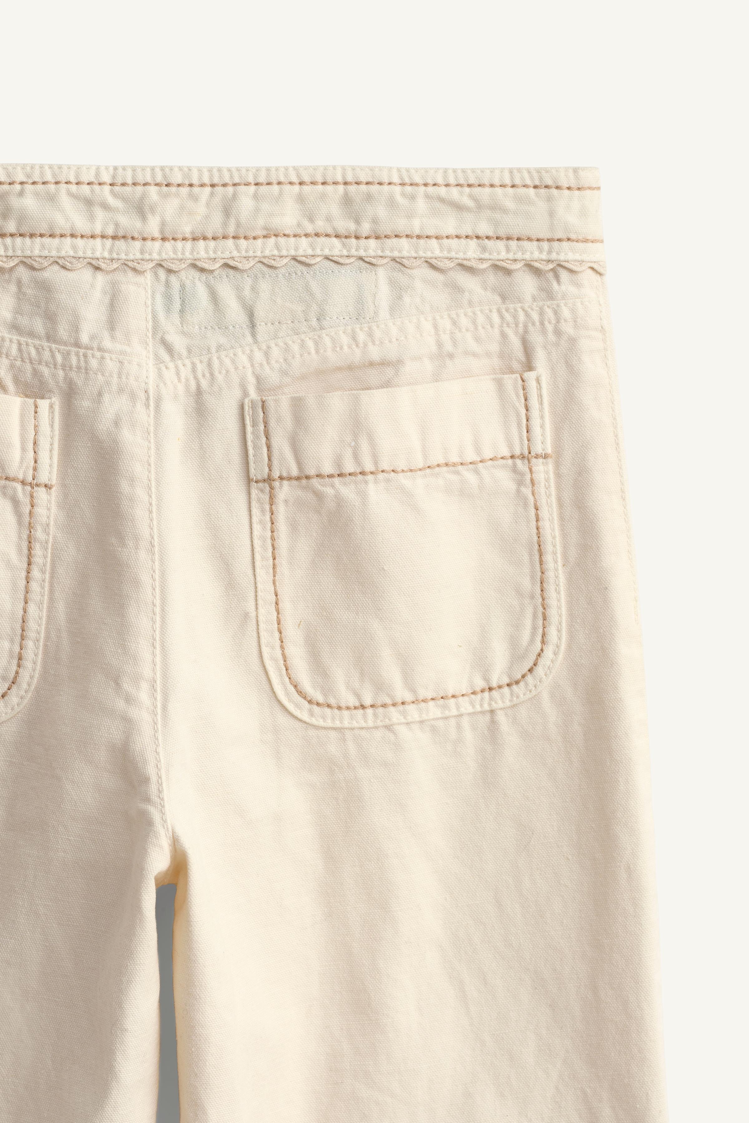 PANTALON FLARE SURPIQÛRES LIMITED EDITION