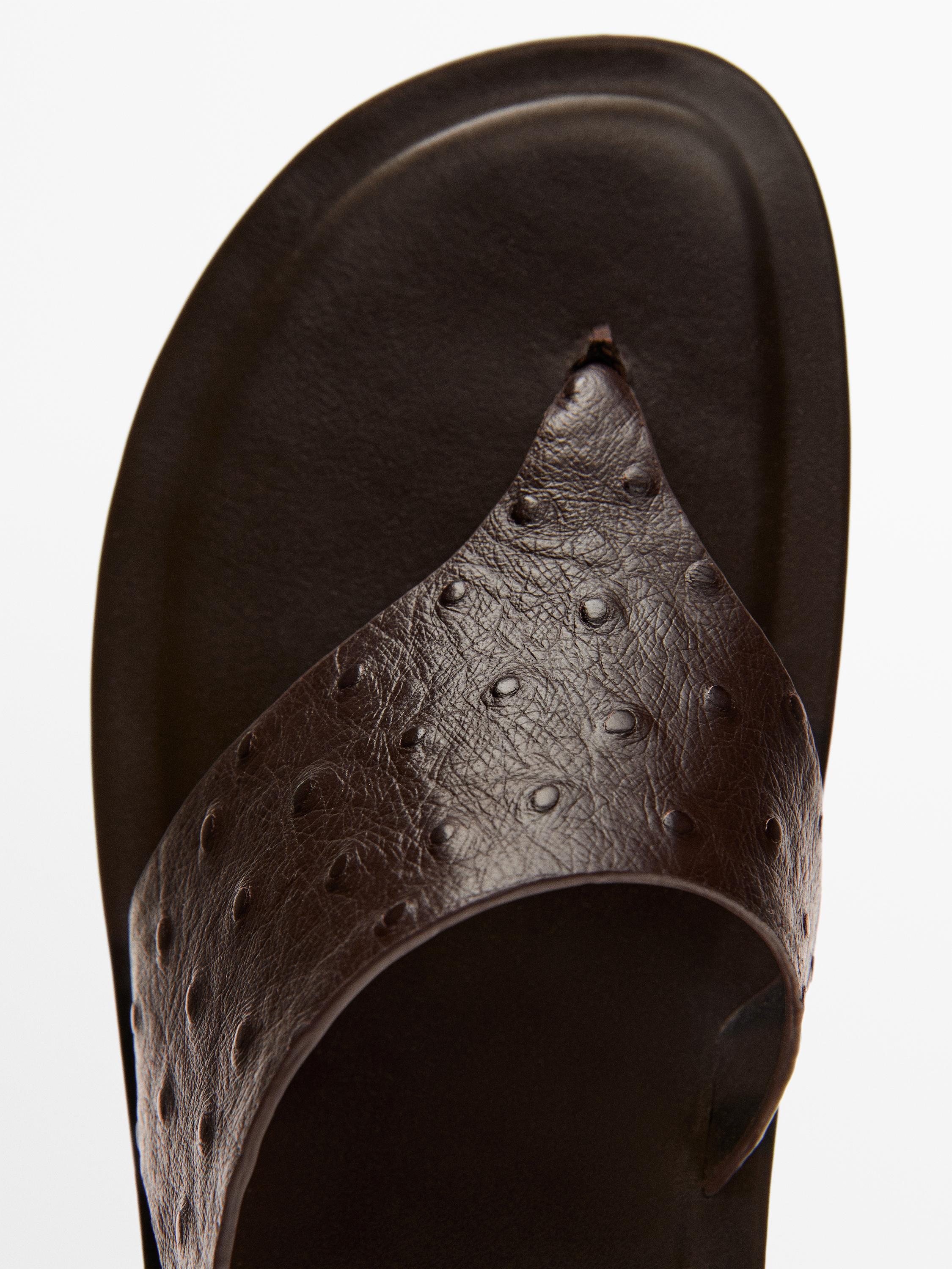 Embossed animal print sandals