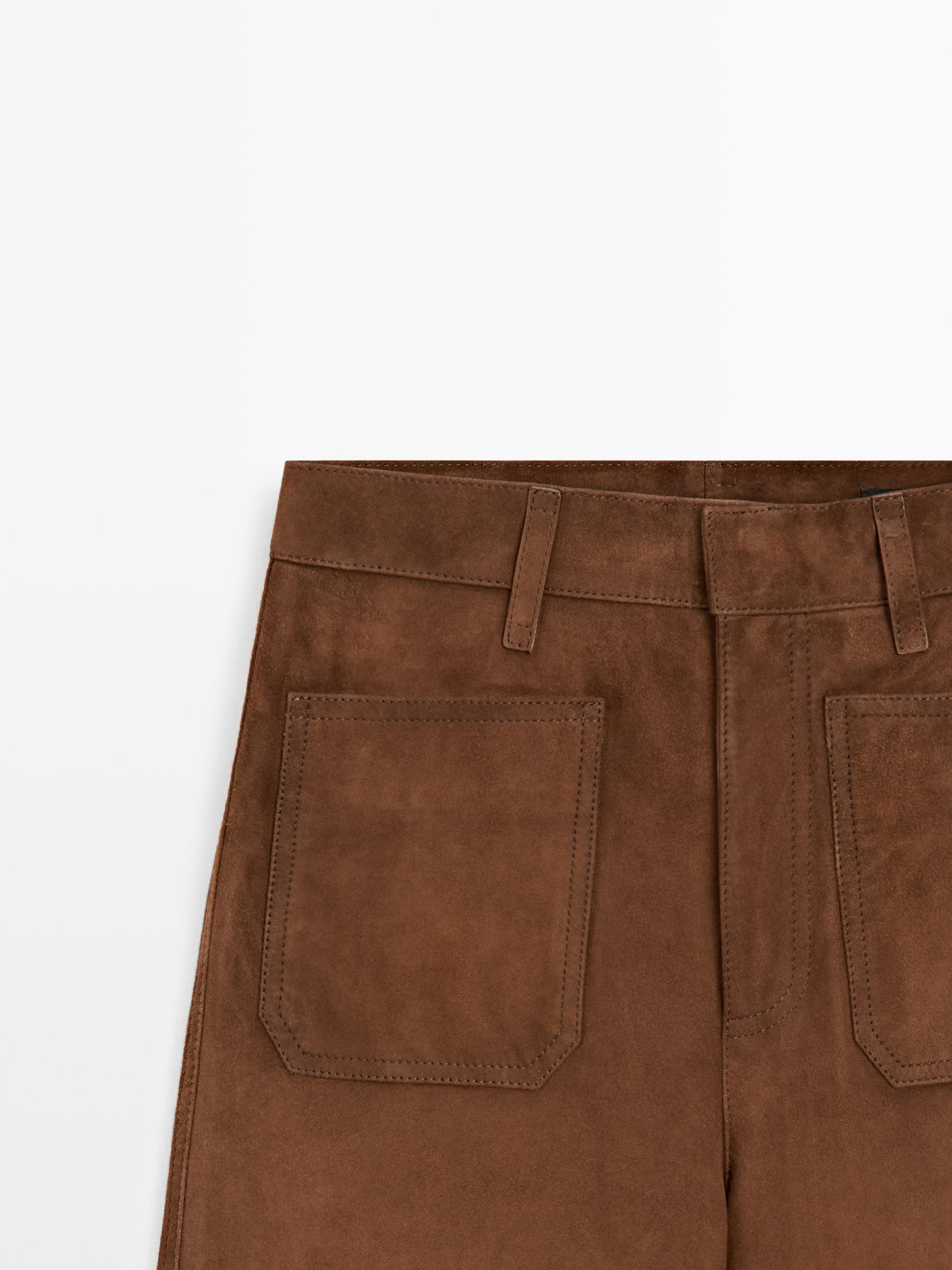 Pantalon large poches en cuir et daim