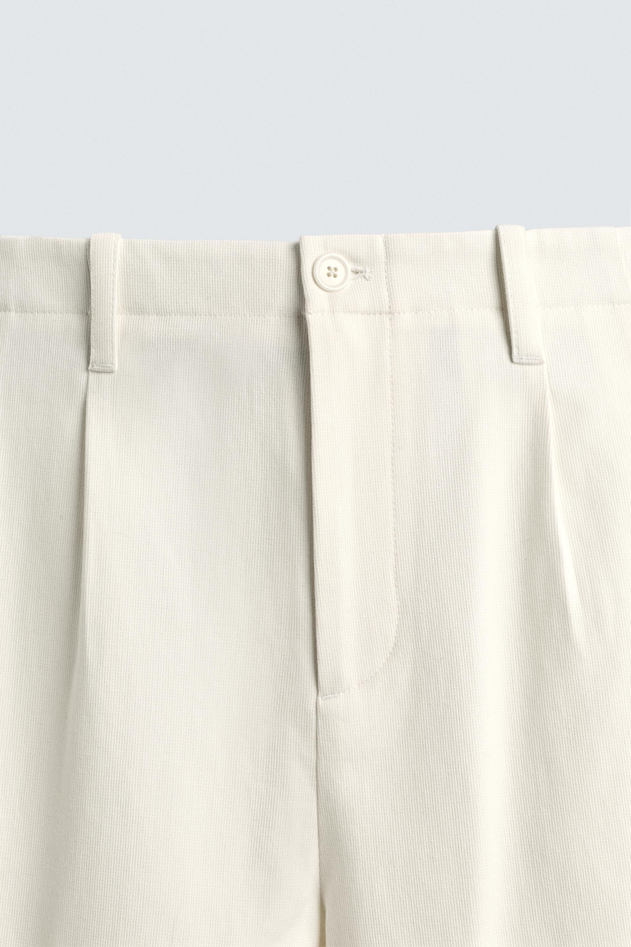 PANTALON CHINO COUPE AMPLE À PLIS