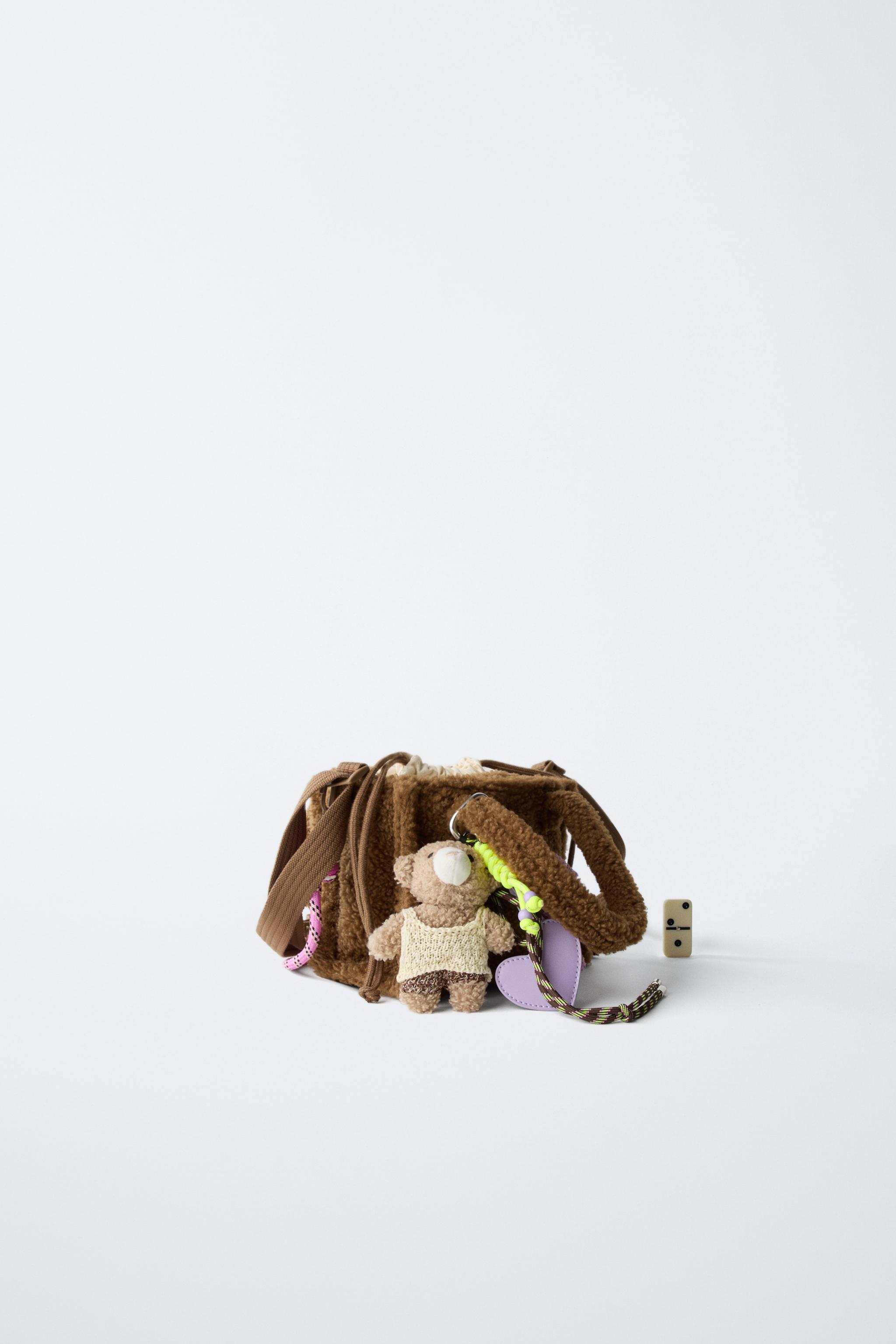 FLEECE CHARM CROSSBODY BAG