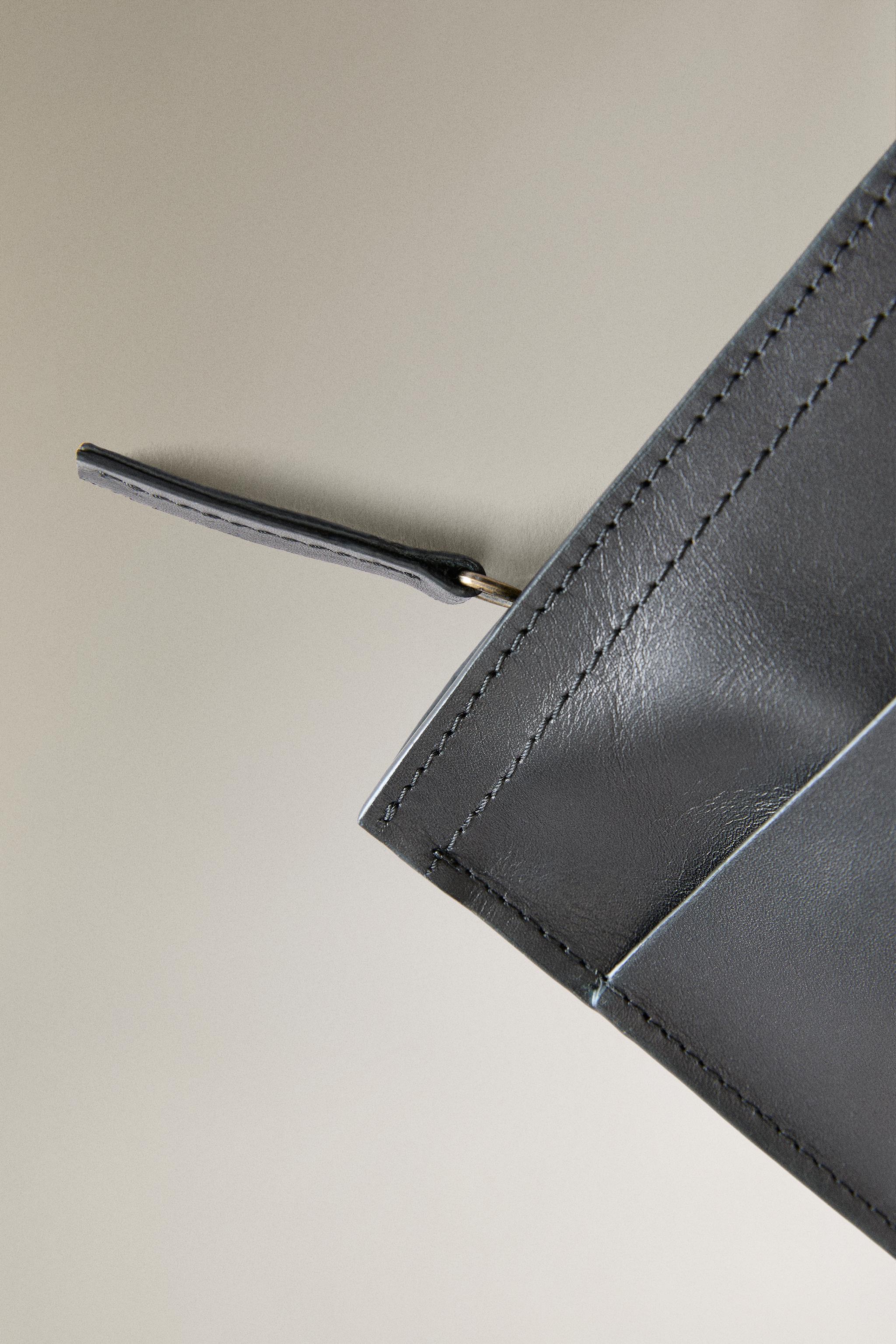 LEATHER MAKEUP BAG CLUTCH