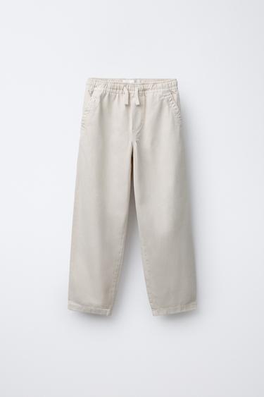 FLOWING ELASTICATED TROUSERS - Light beige by Zara