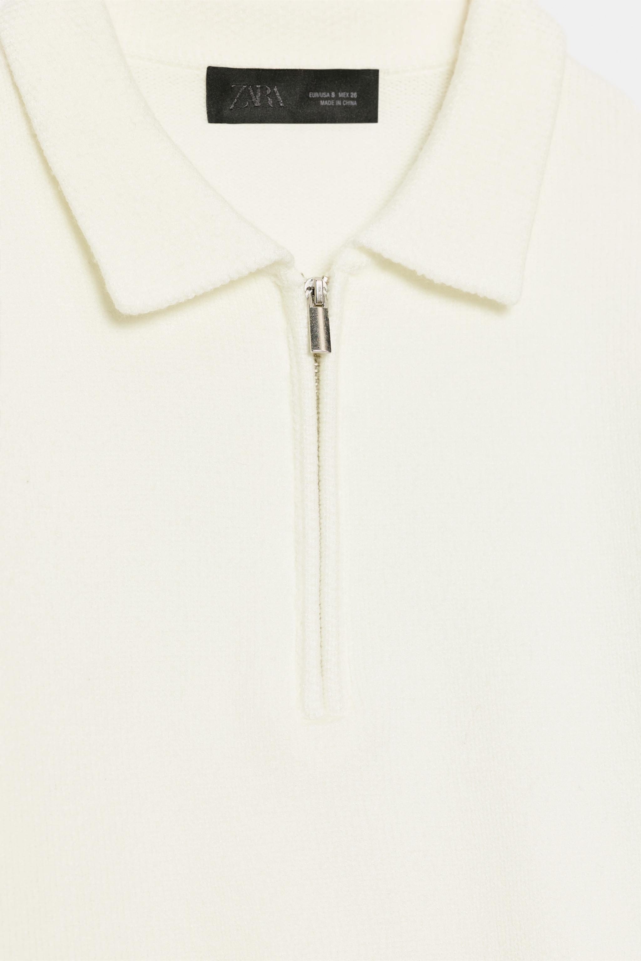 POLO EN MAILLE À ZIP