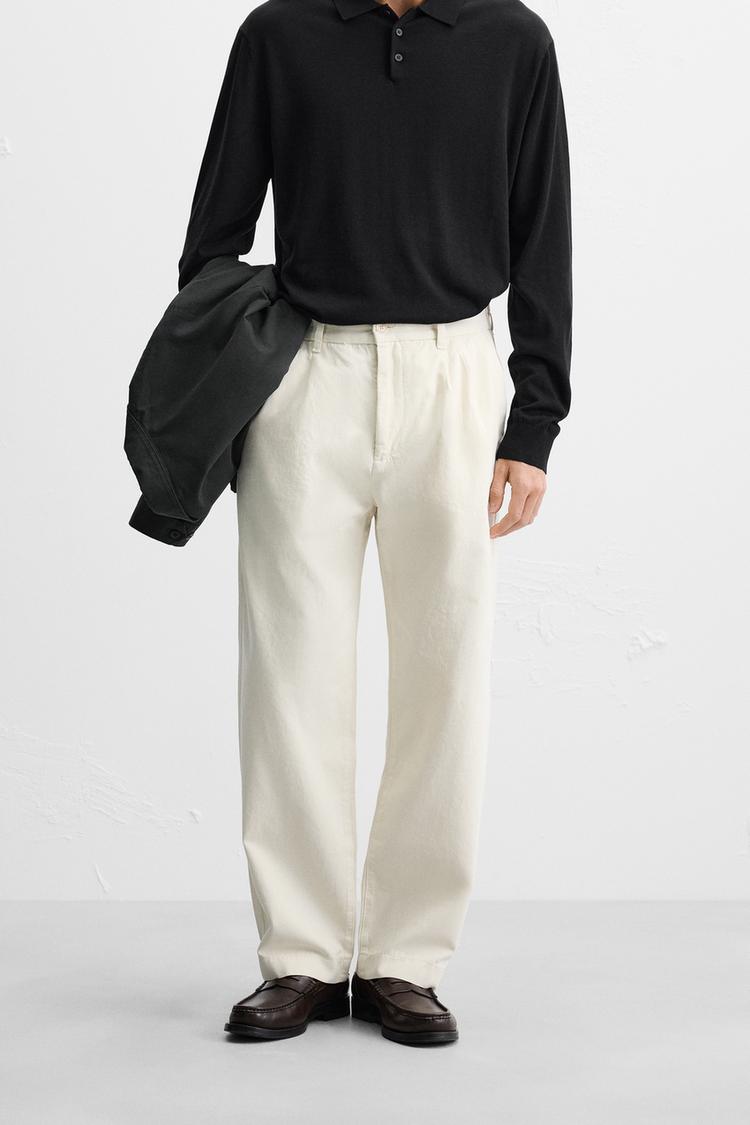RELAXED FIT PLEATED PANTS