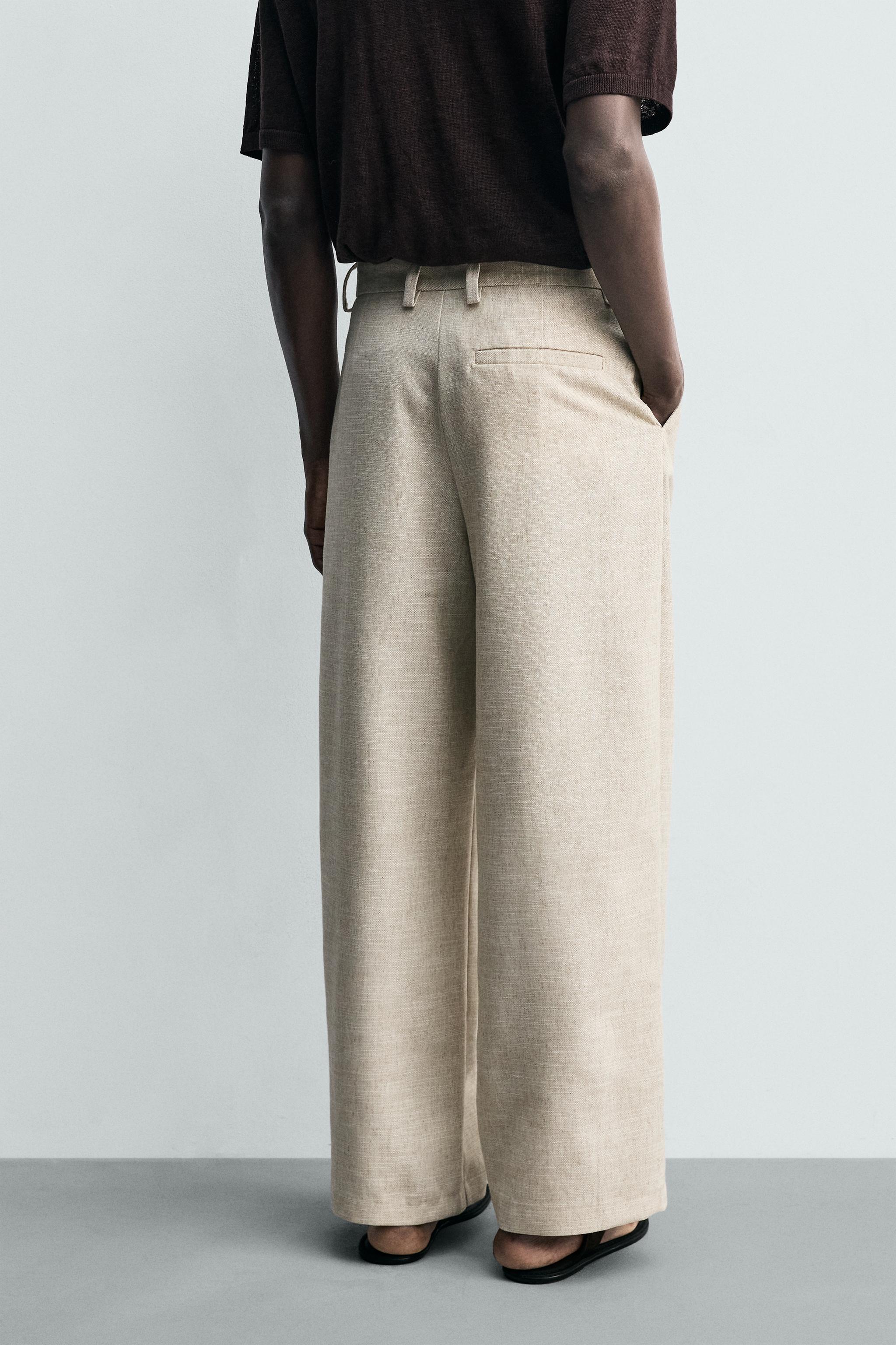 PANTALON COUPE DÉCONTRACTÉE À PLIS