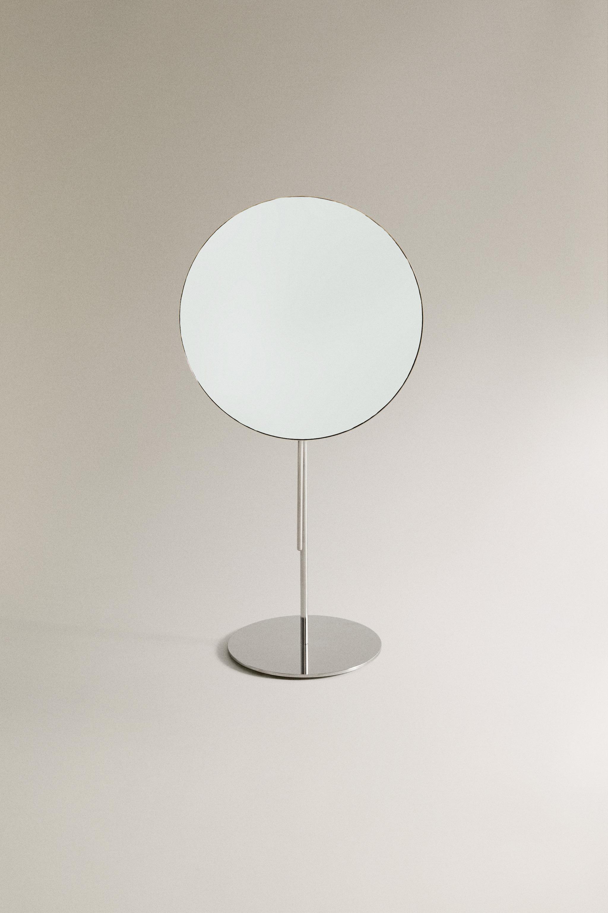 MAGNIFYING METAL MIRROR