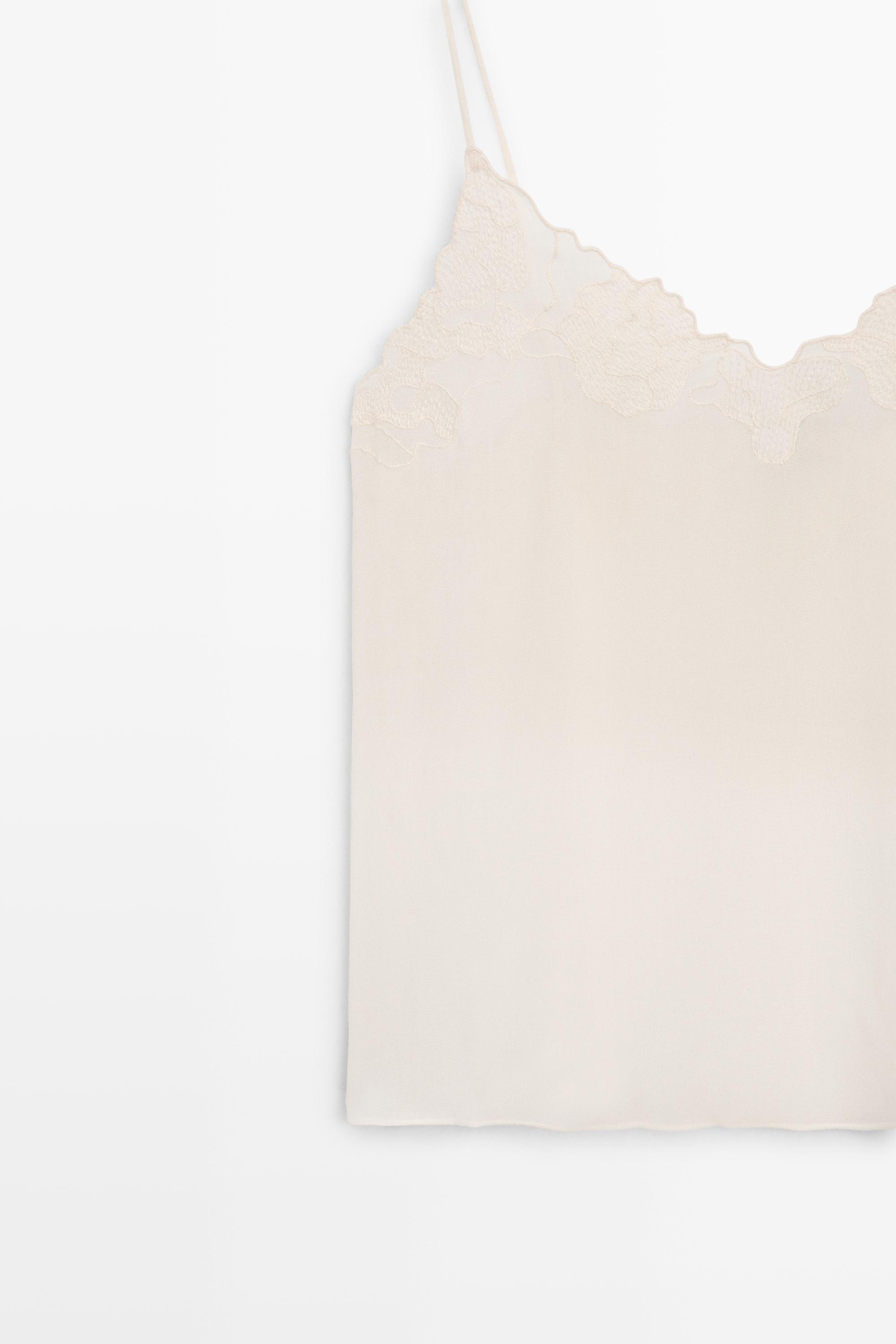 Flowing camisole top with embroidered detail