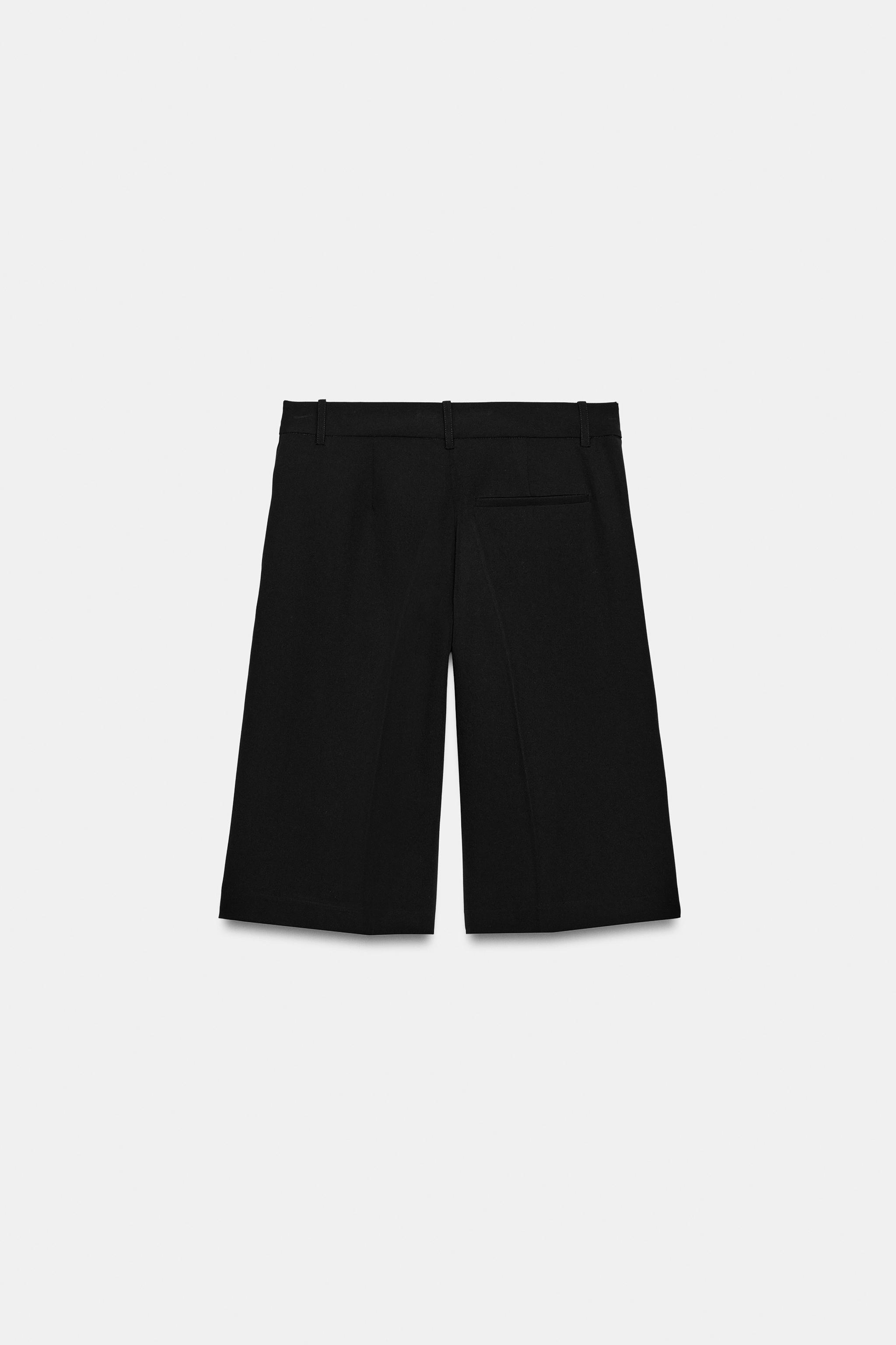 LONG PLEATED BERMUDA SHORTS