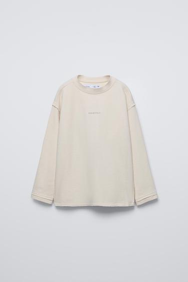 CAMISETA TEXTO BORDADO - Blanco roto de Zara